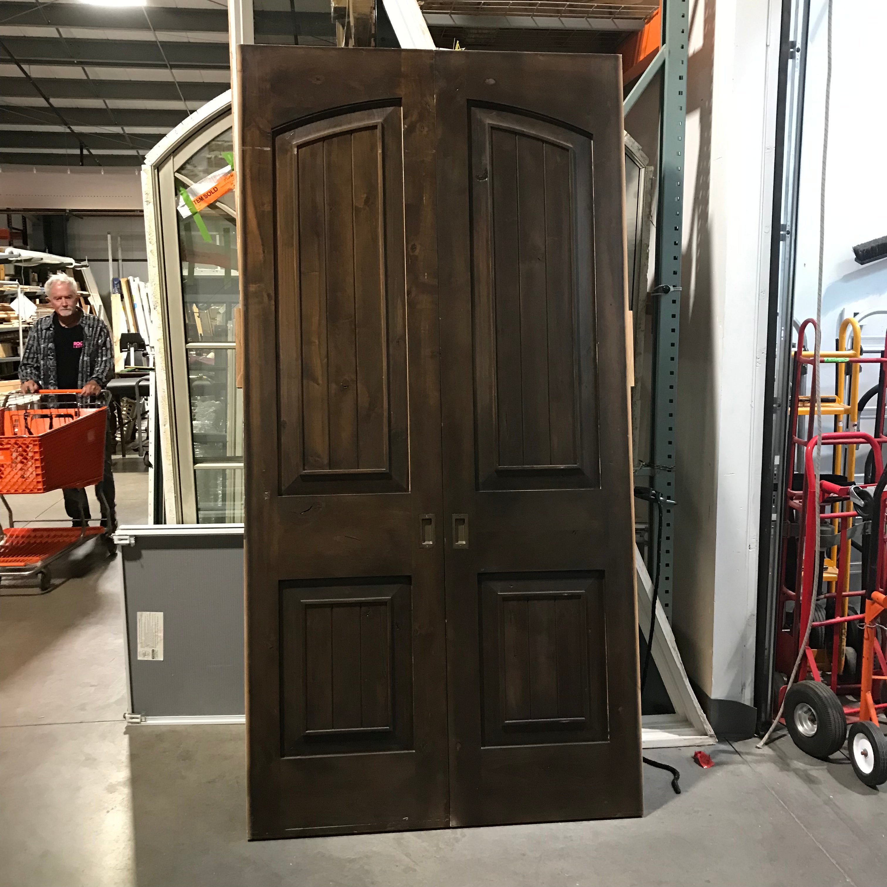 48"x 95"x 1.75" Stained Knotty Alder Pocket Doors (pair)