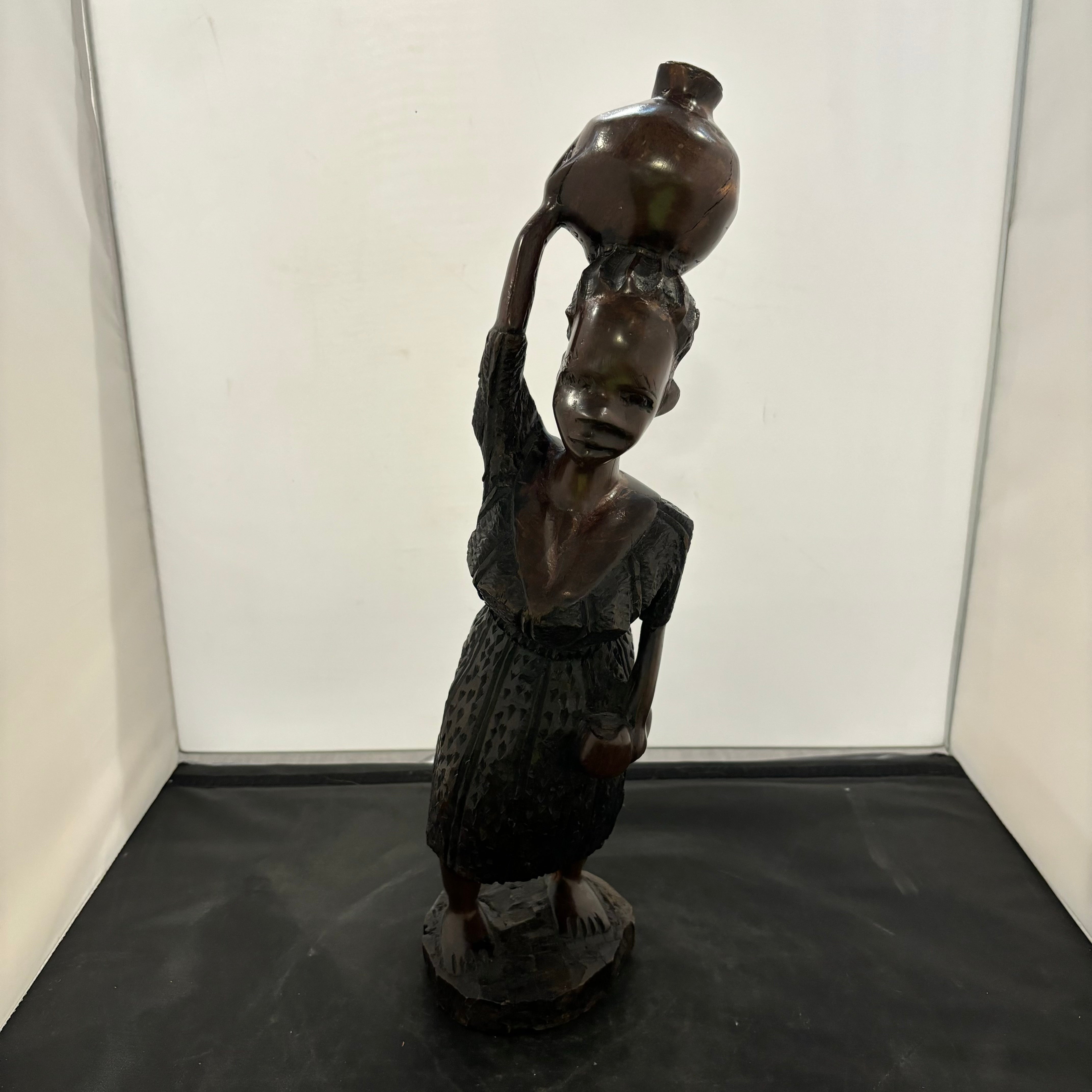 Hand Carved Iron Wood Leaning Woman with Jug on Head Figurine 19"x 5"