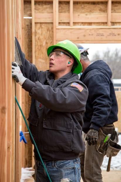 POST INDEPENDENT- Photos: CMC, high school students volunteer with Habitat for Humanity