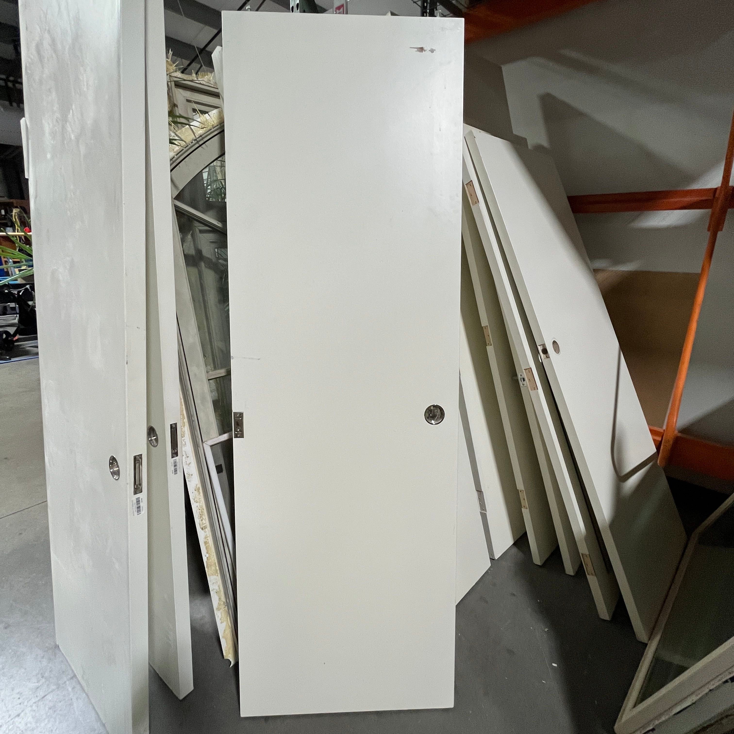 24"x 93"x 1.75" White Solid Slab Interior Pocket Door