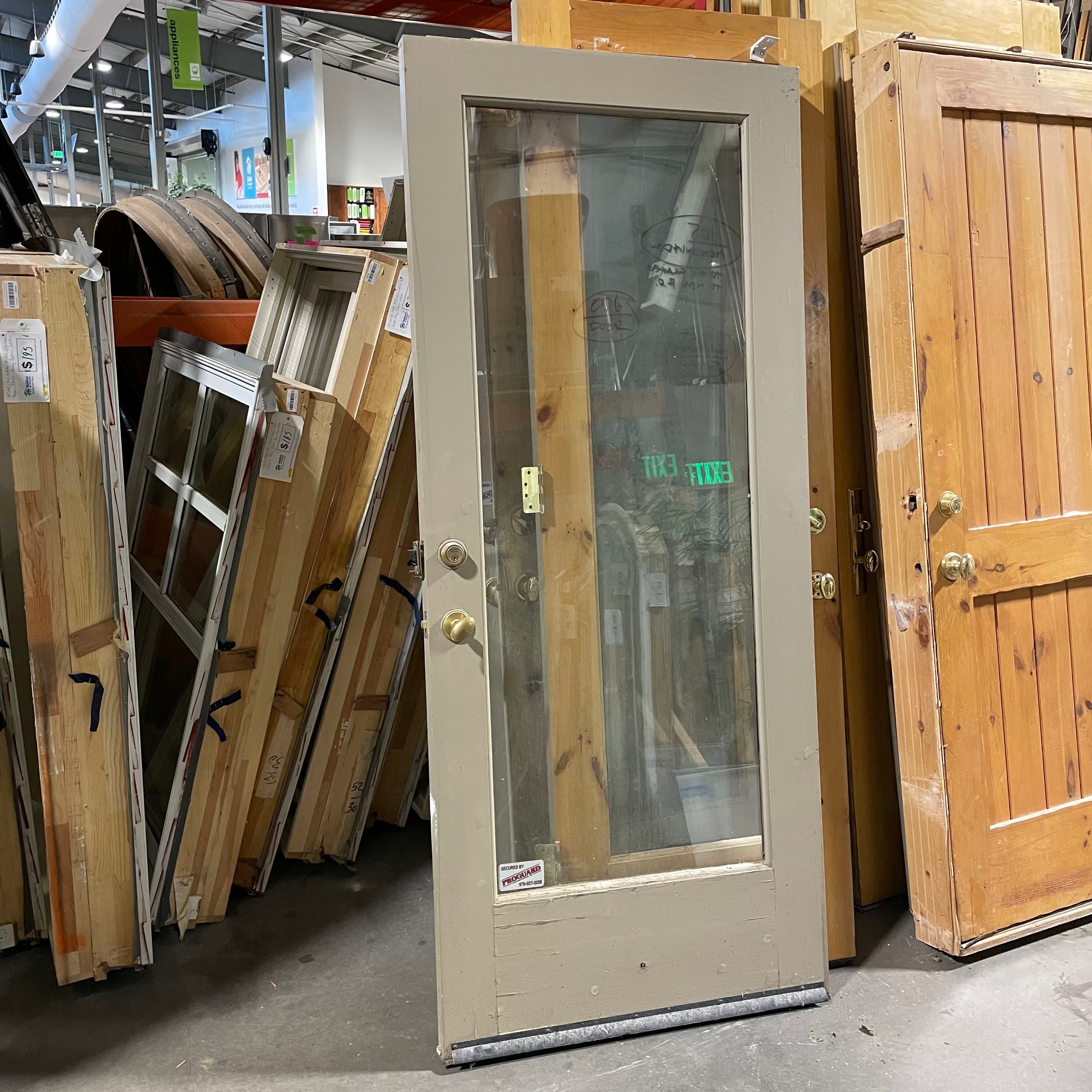 29.5"x 88.75"x 1.75" One Glass Panel Painted Gray One Side Honey Stained Other Side Solid Knotty Pine Exterior Door