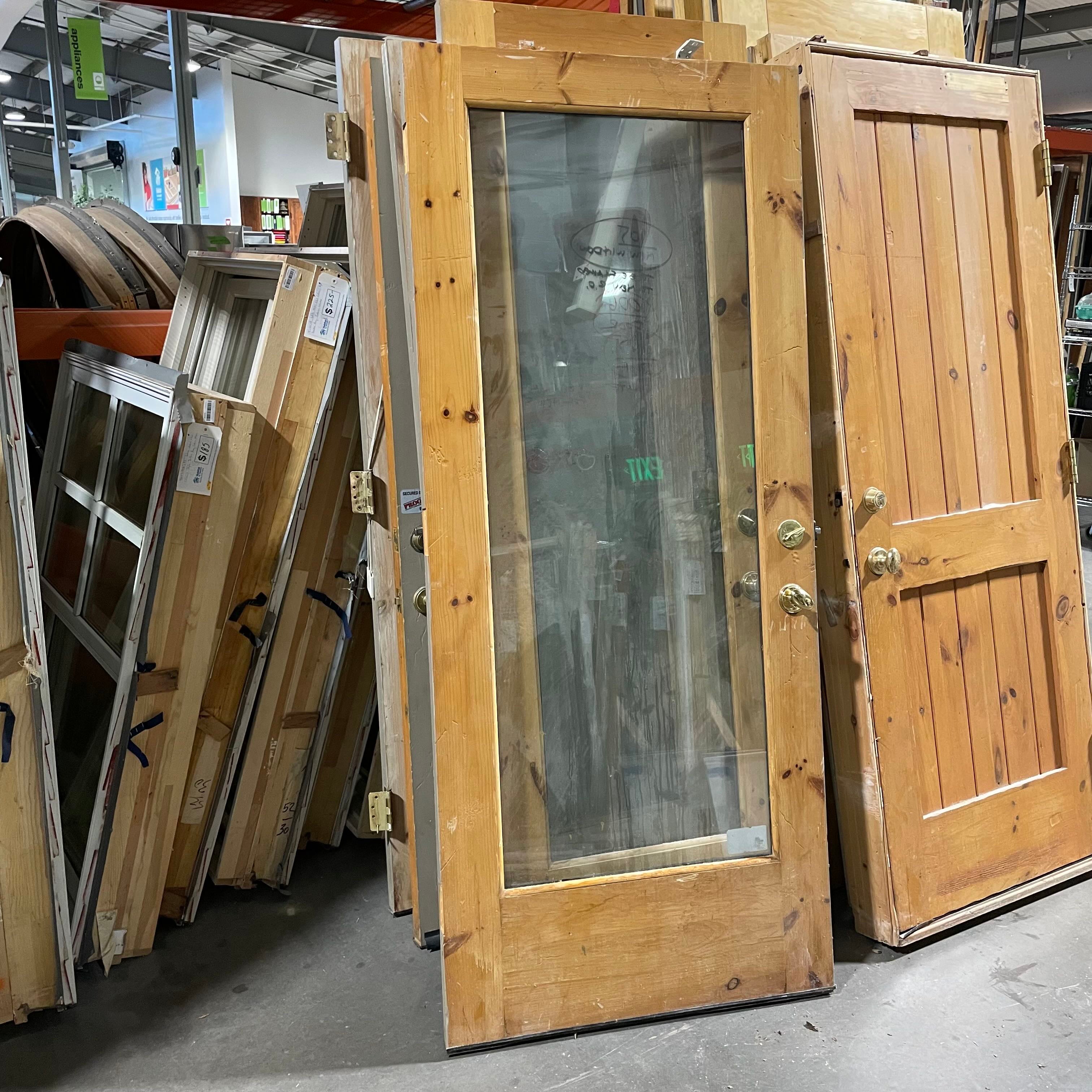 29.5"x 88.75"x 1.75" One Glass Panel Painted Gray One Side Honey Stained Other Side Solid Knotty Pine Exterior Door