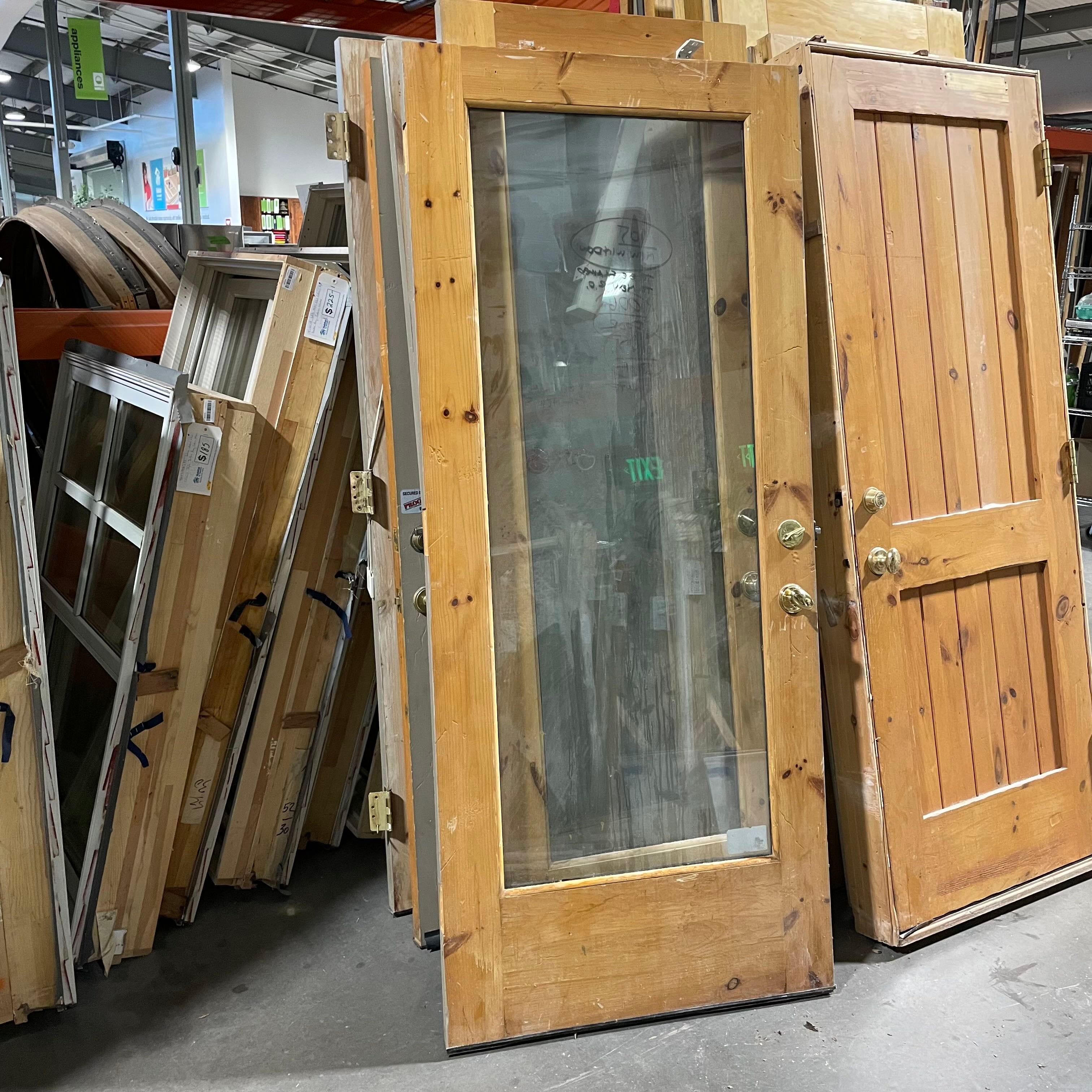 31.5"x 88.75"x 1.75" One Glass Panel One Side Painted Gray One Side Honey Stained Knotty Pine Exterior Door