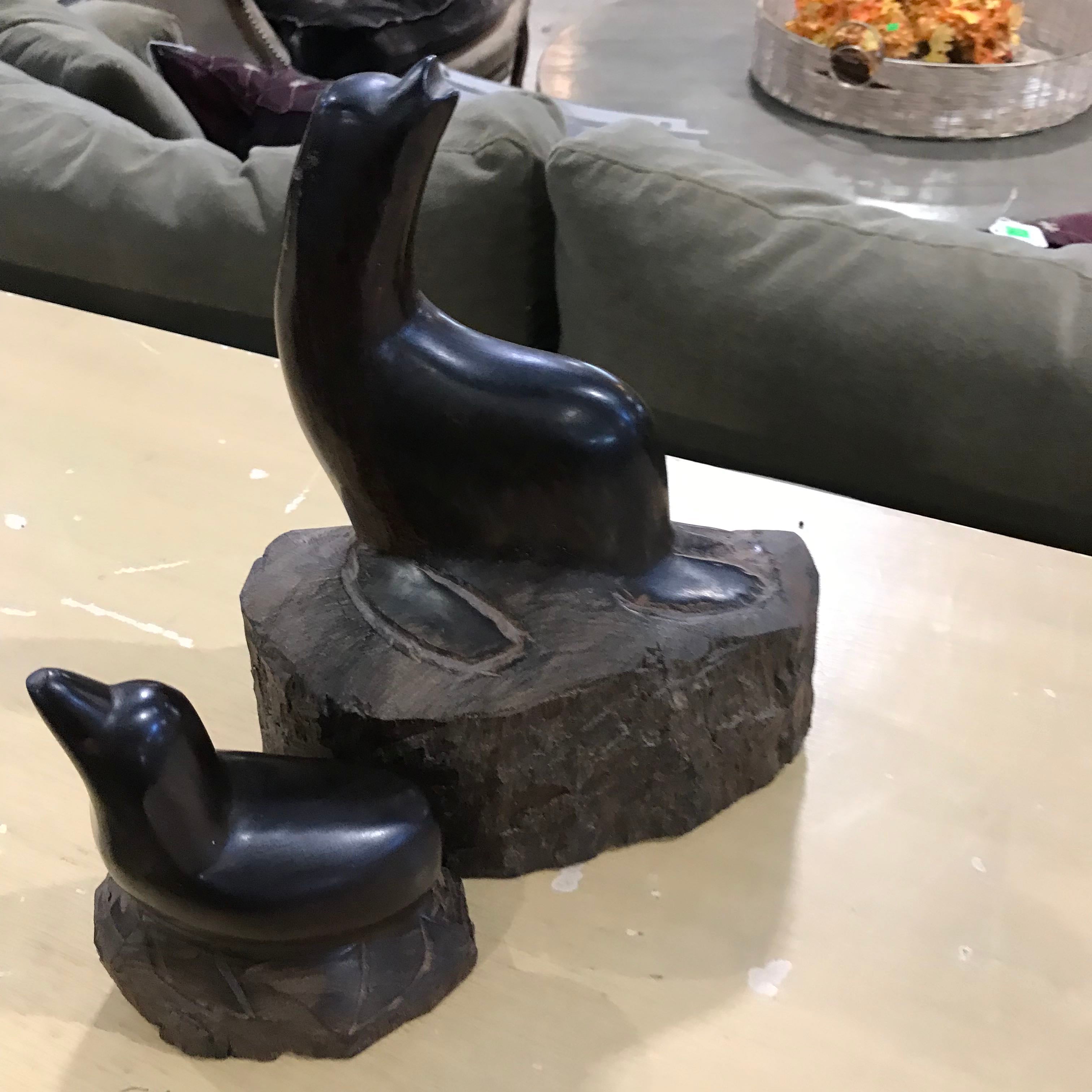 Set of 2 Iron Wood Carved Sea Lions