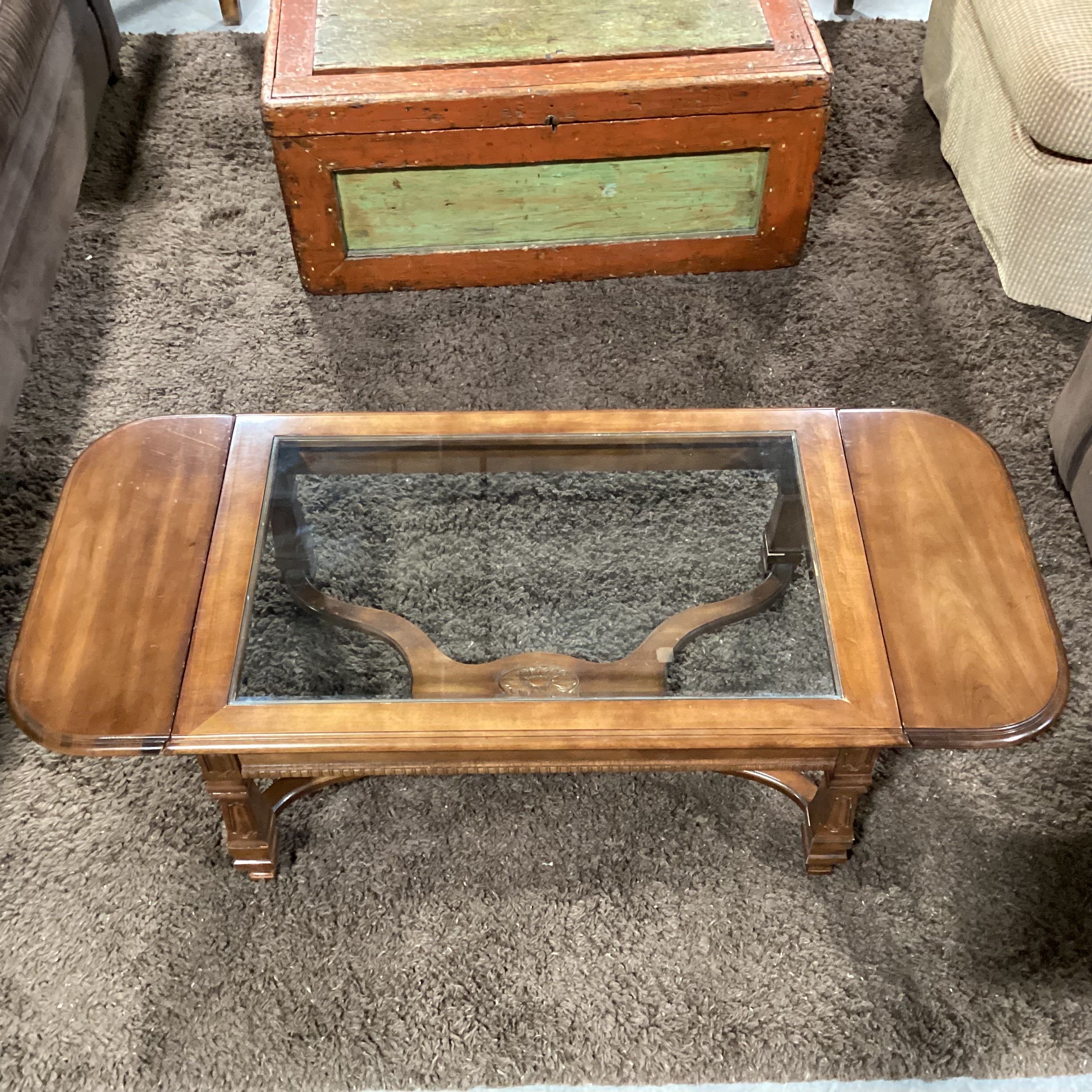 Carved Wood Trestle and Drop Sides Glass Top Coffee Table