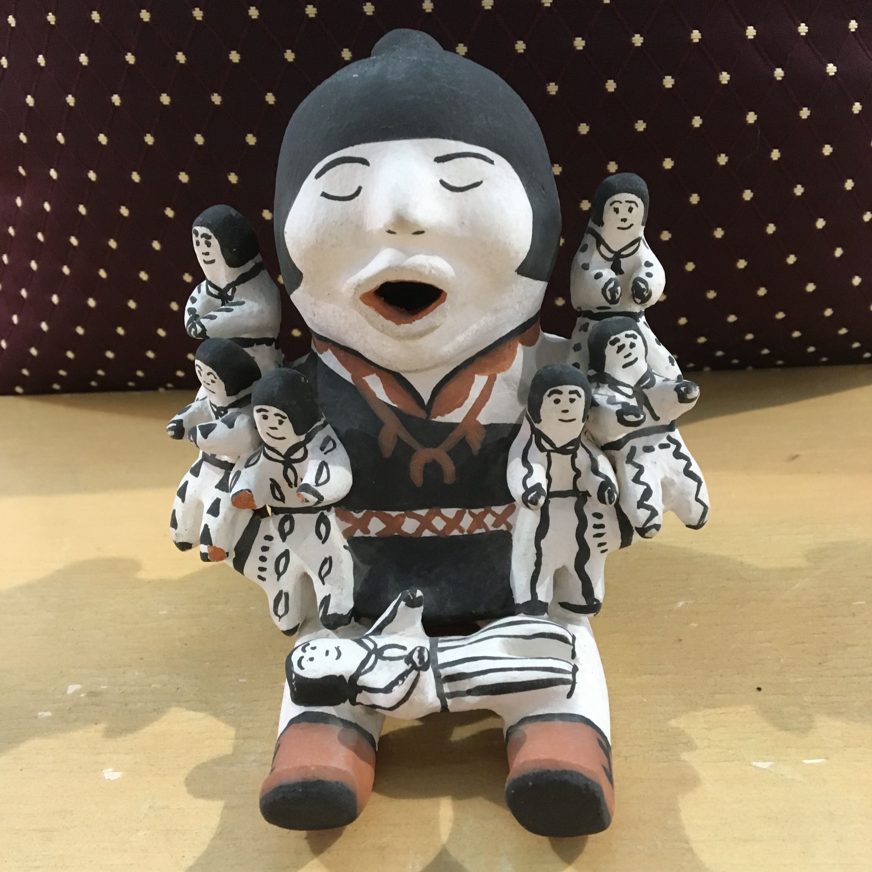 Martha Arguero Seven Baby Storyteller Figurine