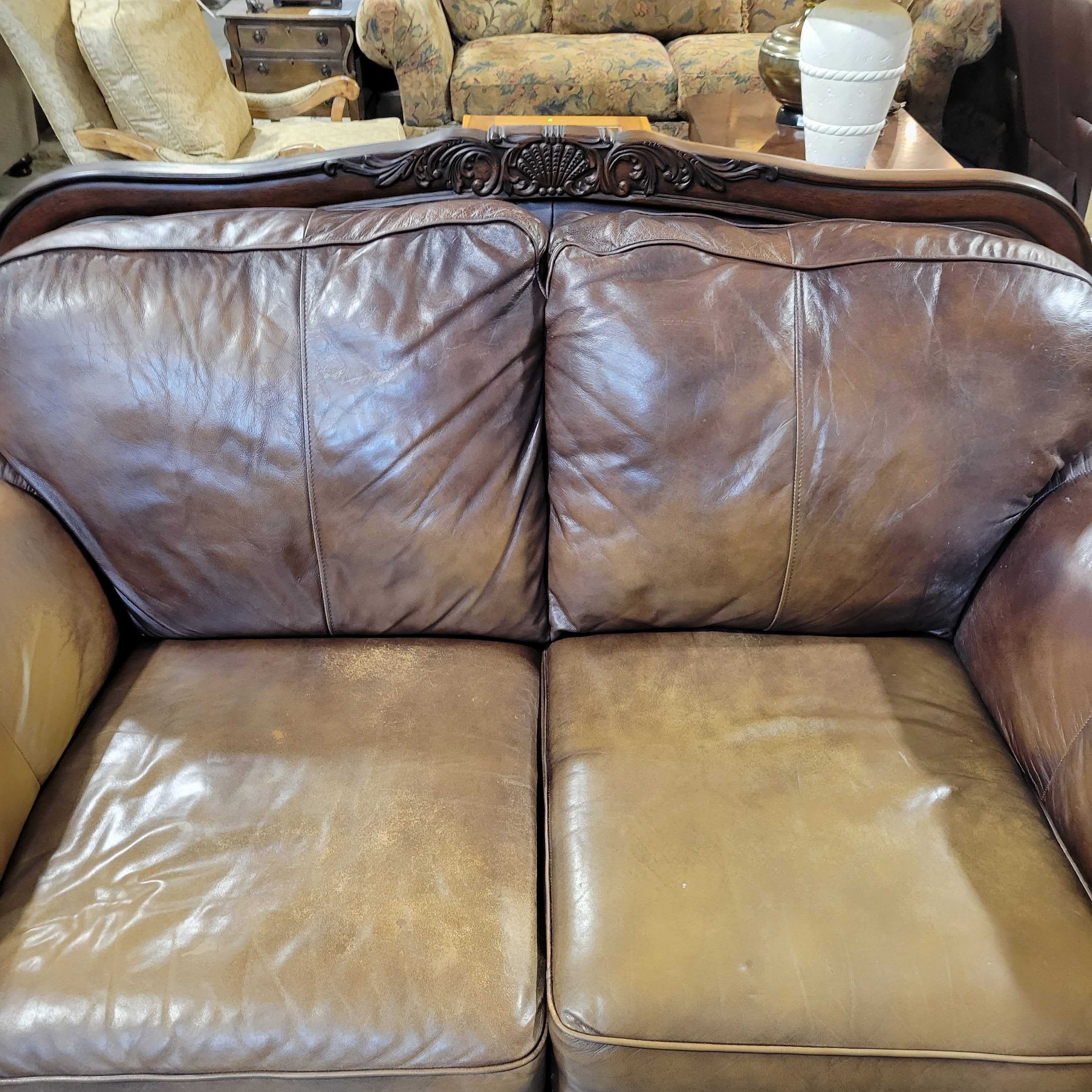 Ashley Furniture Carved Wood & Brown Leather Loveseat Sofa