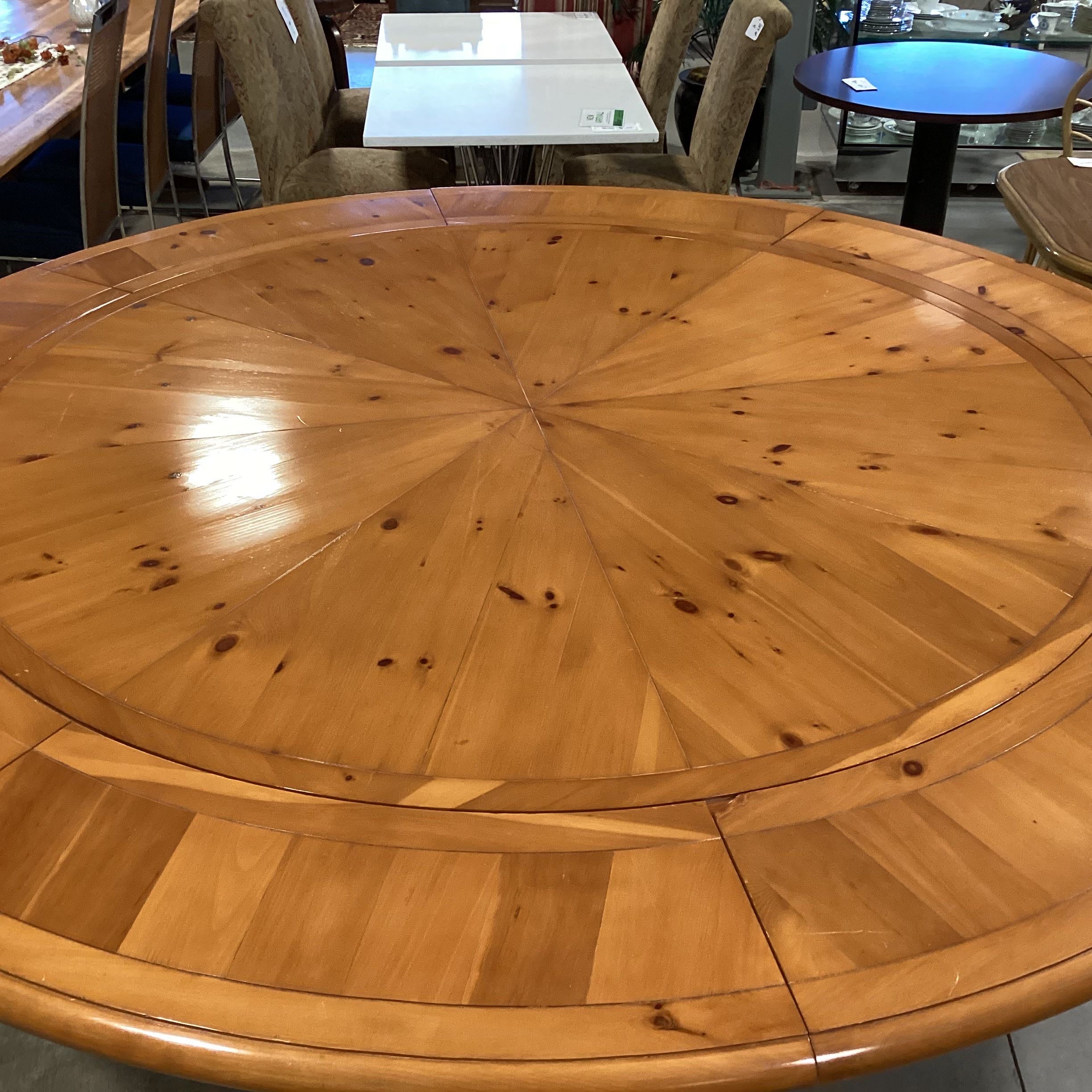 Round Finished Pine with 8 Clip in Extended Leaves Dining Table