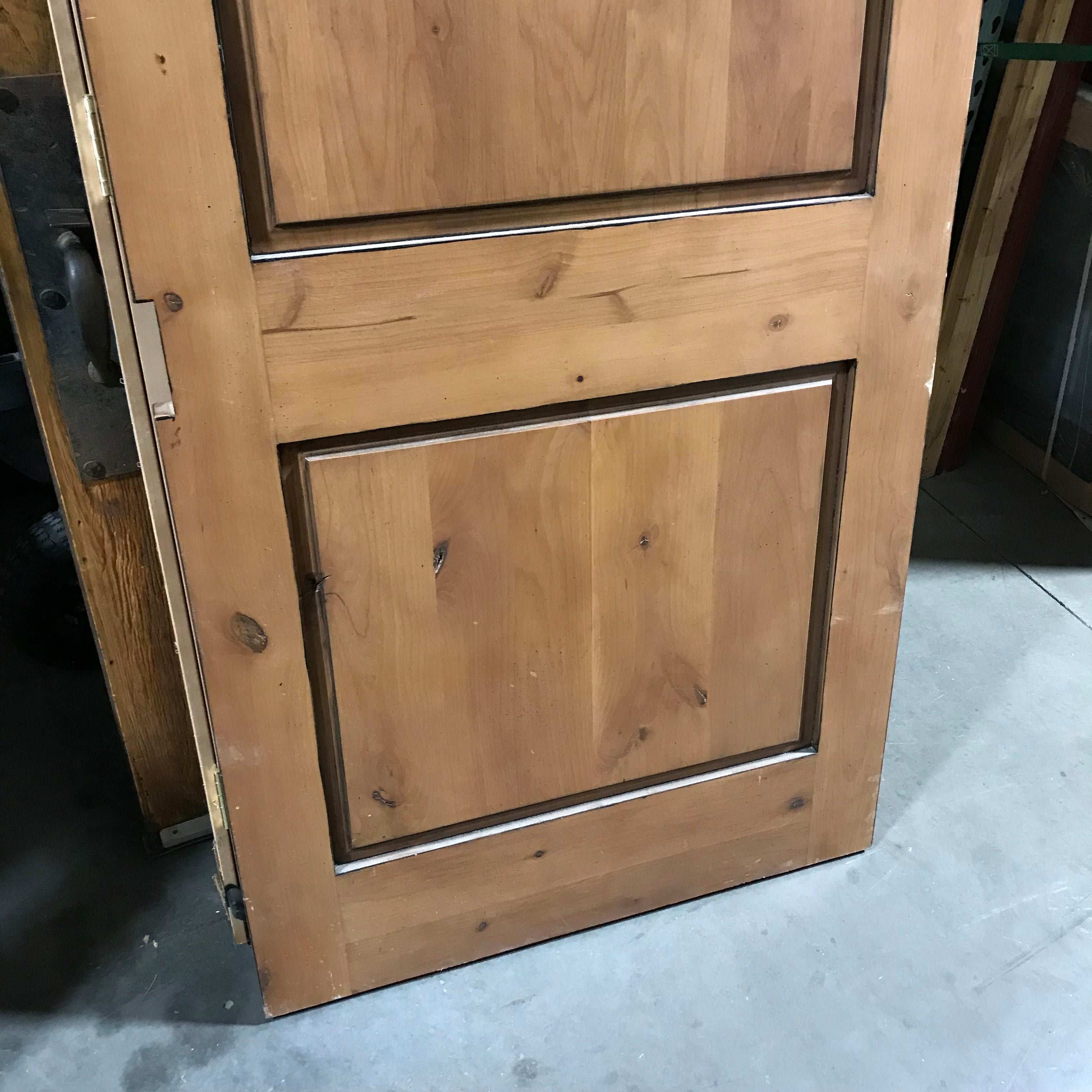 32"x 79.25"x 1.75" 2 Panel Brown Knotty Alder Interior Pocket Door