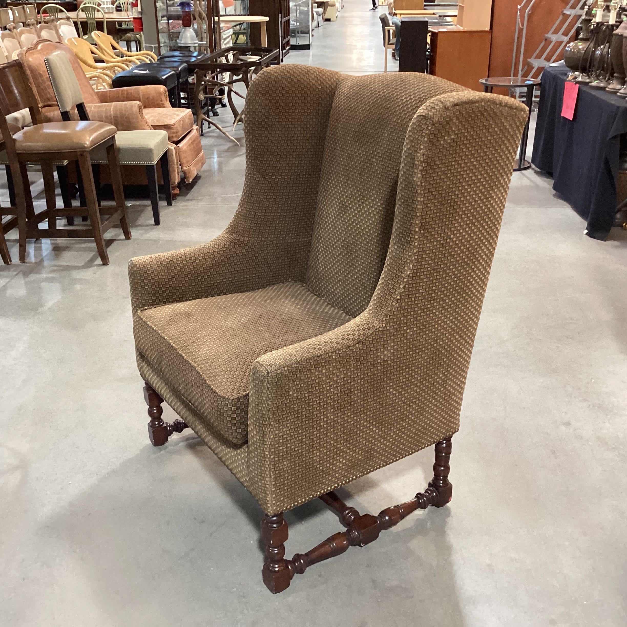 Brown Pattern & Carved Wood Wing Chair