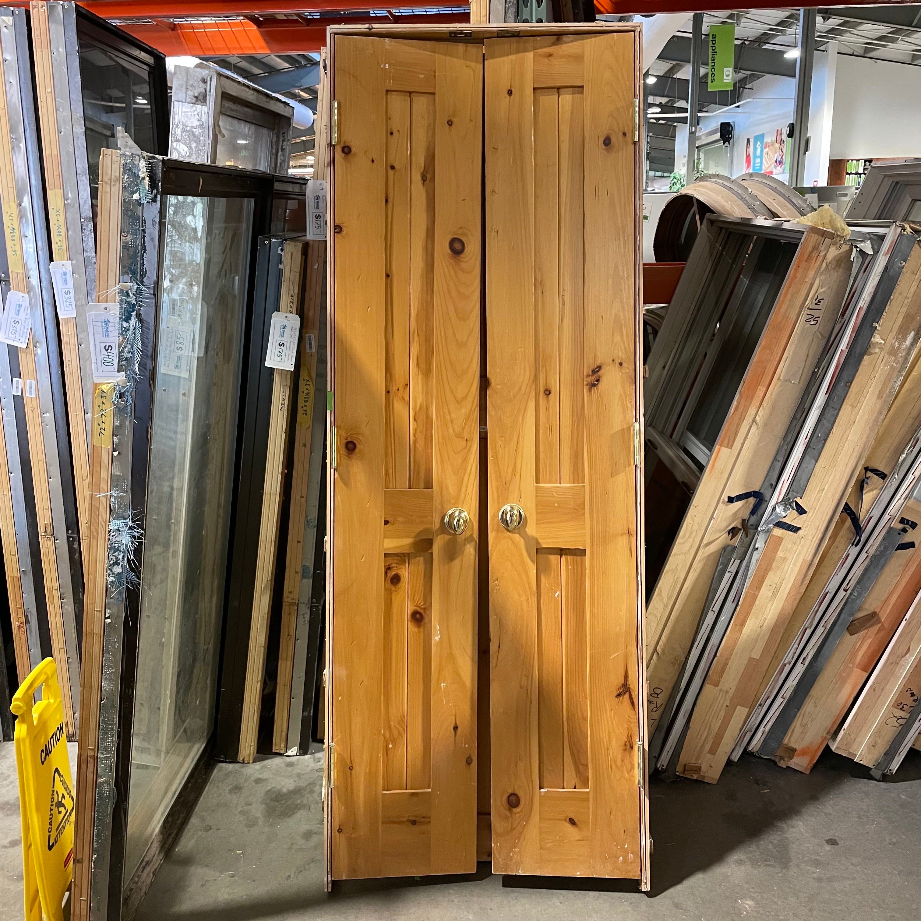 29.5"x 84"x 1.75" 2 Panel Wainscot Knotty Pine Honey Finish Set of Closet Doors w/ Jamb