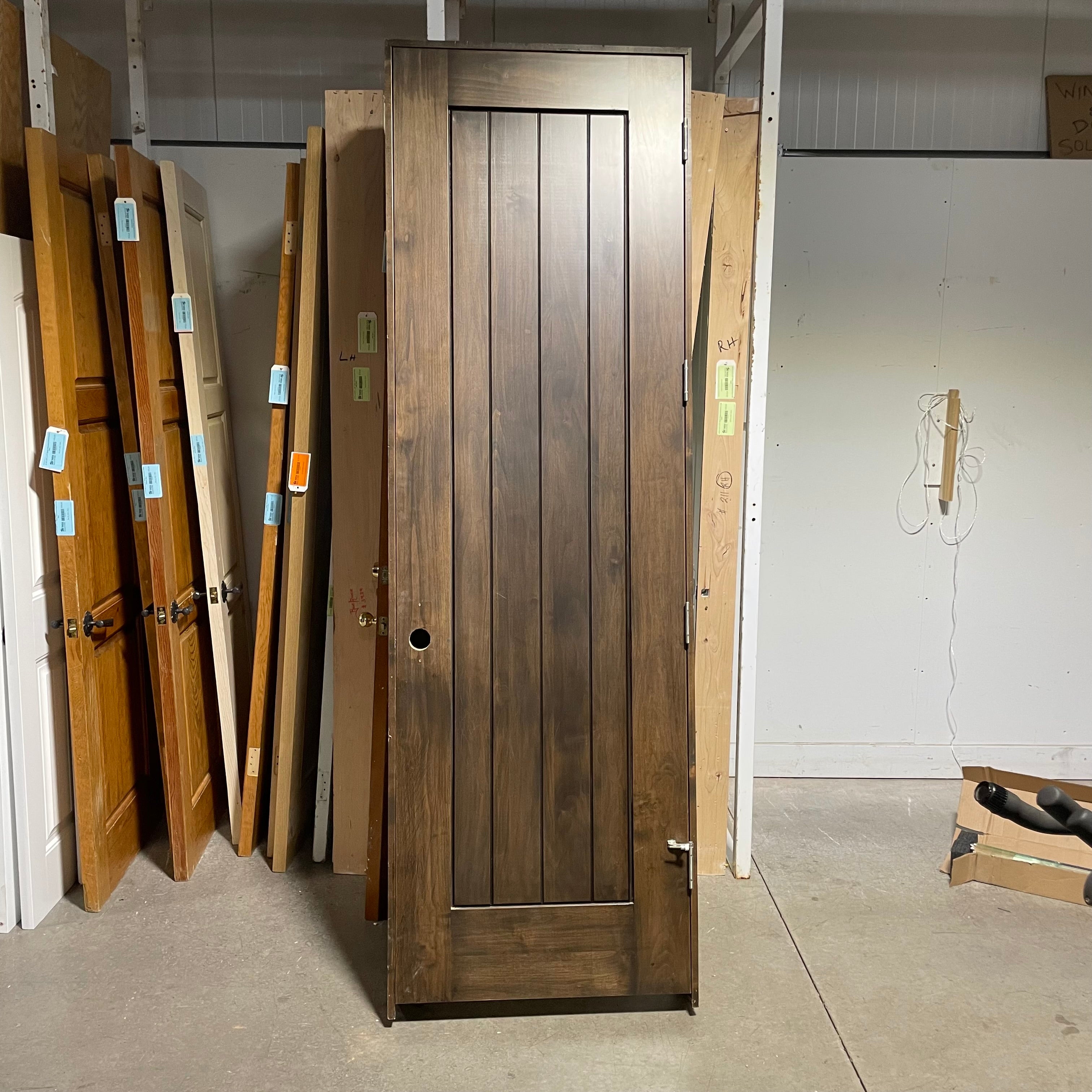 29.75"x 96"x 1.75" Rough Opening is 31.5"x 98.5"x 6.75" Brown Vertical Lined Walnut Interior Door with Jamb