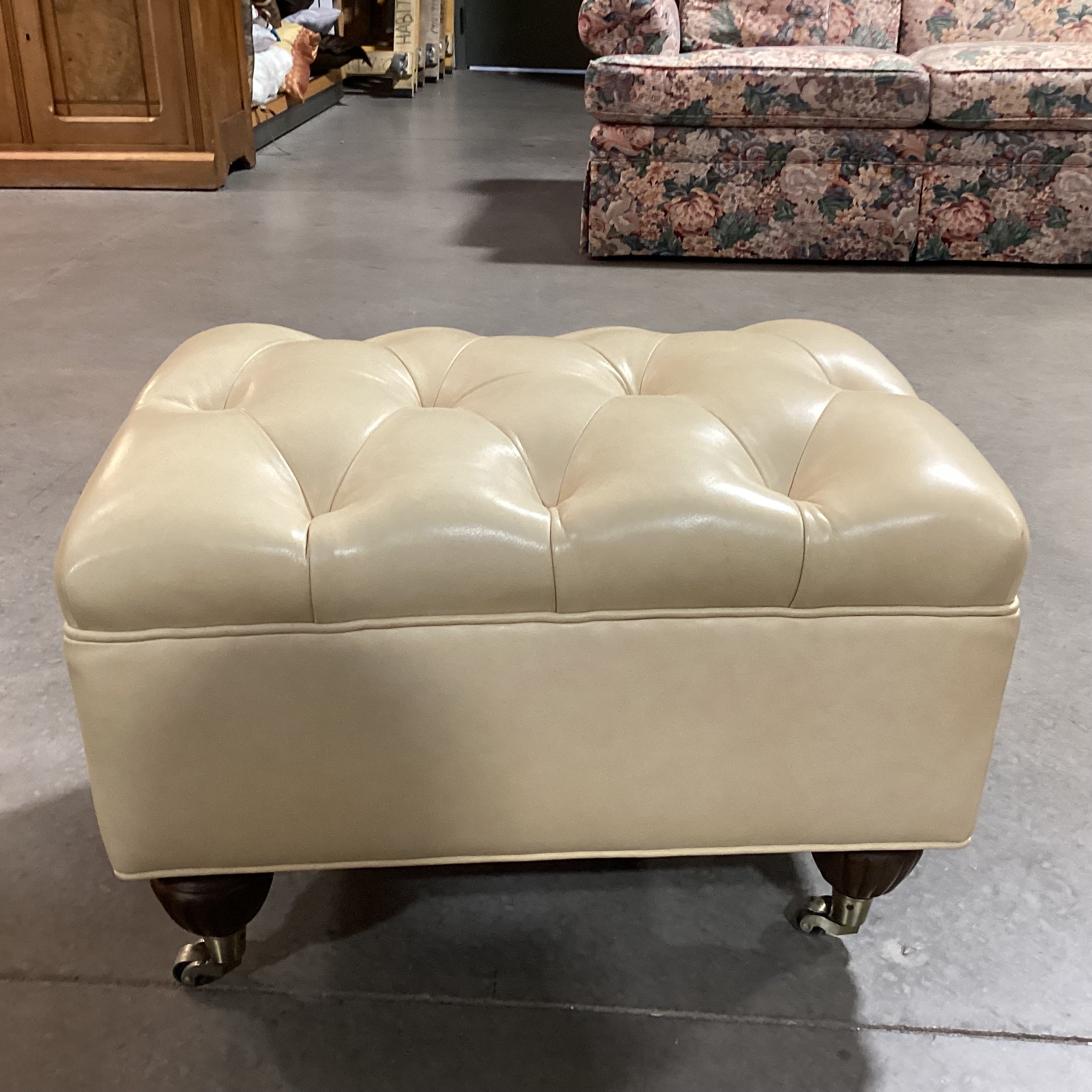 Blonde Leather Tufted Carved Wood & Caster Feet Ottoman 25"x 18"x 17"