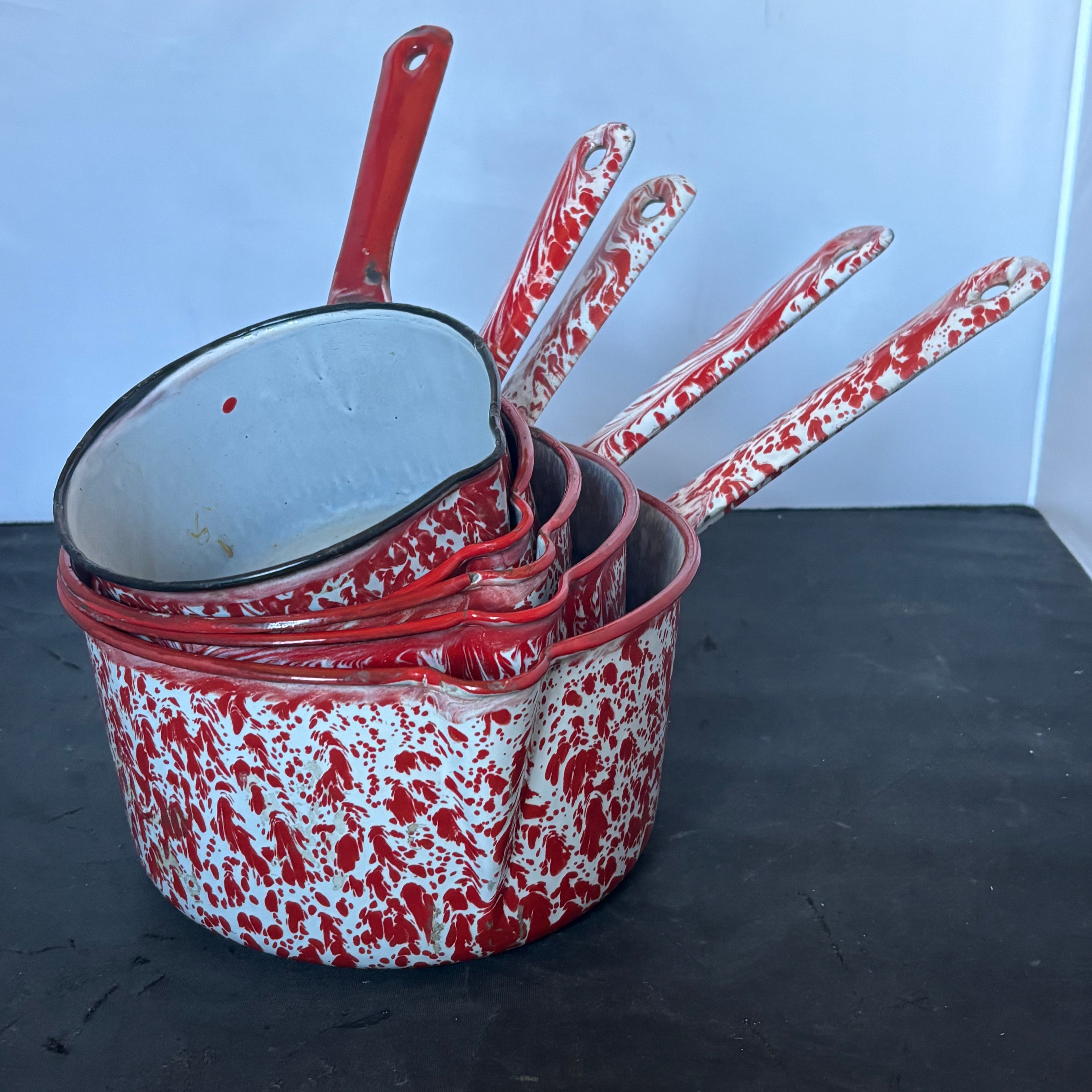 Set of 5 Antique Graduating Red Enamel Splatterware Sauce Pans with Po ...