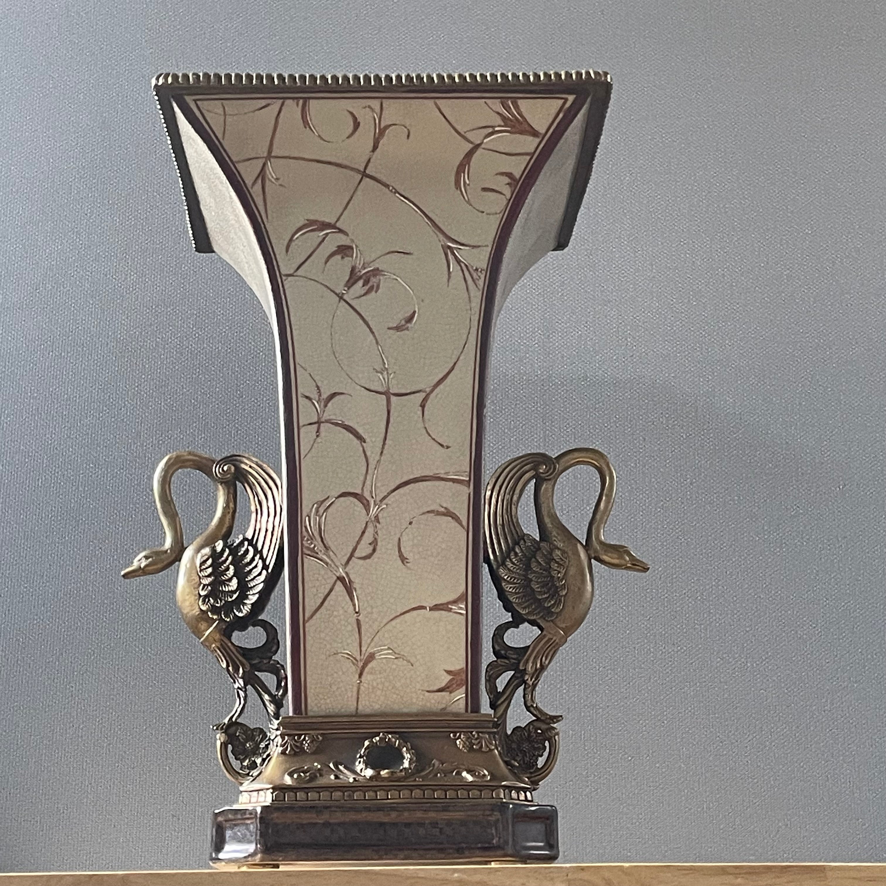 Castilian Imports Enamel Decorated Crackle Glazed Porcelain with Brass Swans on Footed Vase/Plinth, 12"x 9.5"x 17"