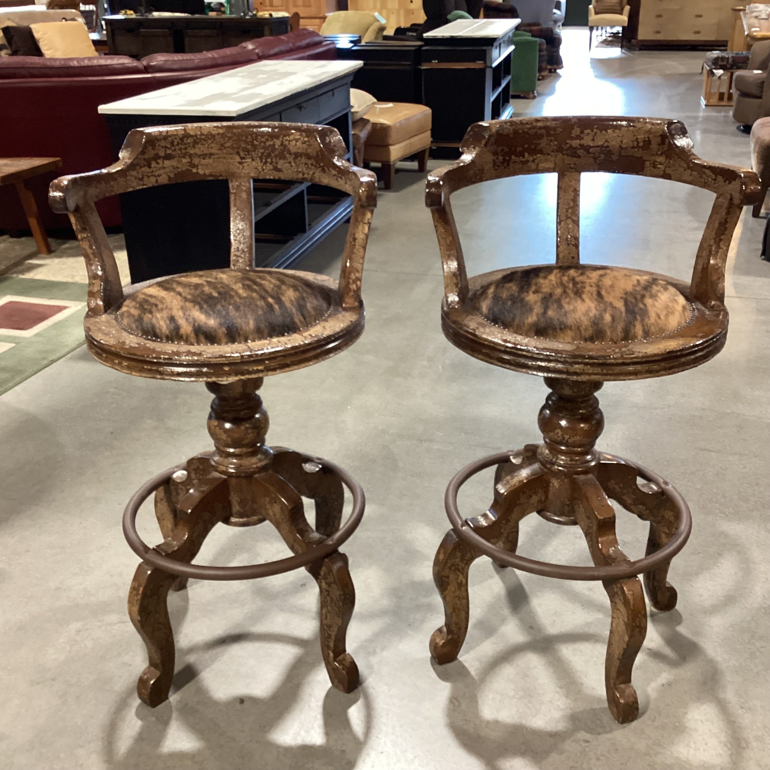 SET of 2 CBS Carved Wood Dark Desert Finish with Crackle Detail Brindle Cowhide Nailhead Swivel Barstools 31"