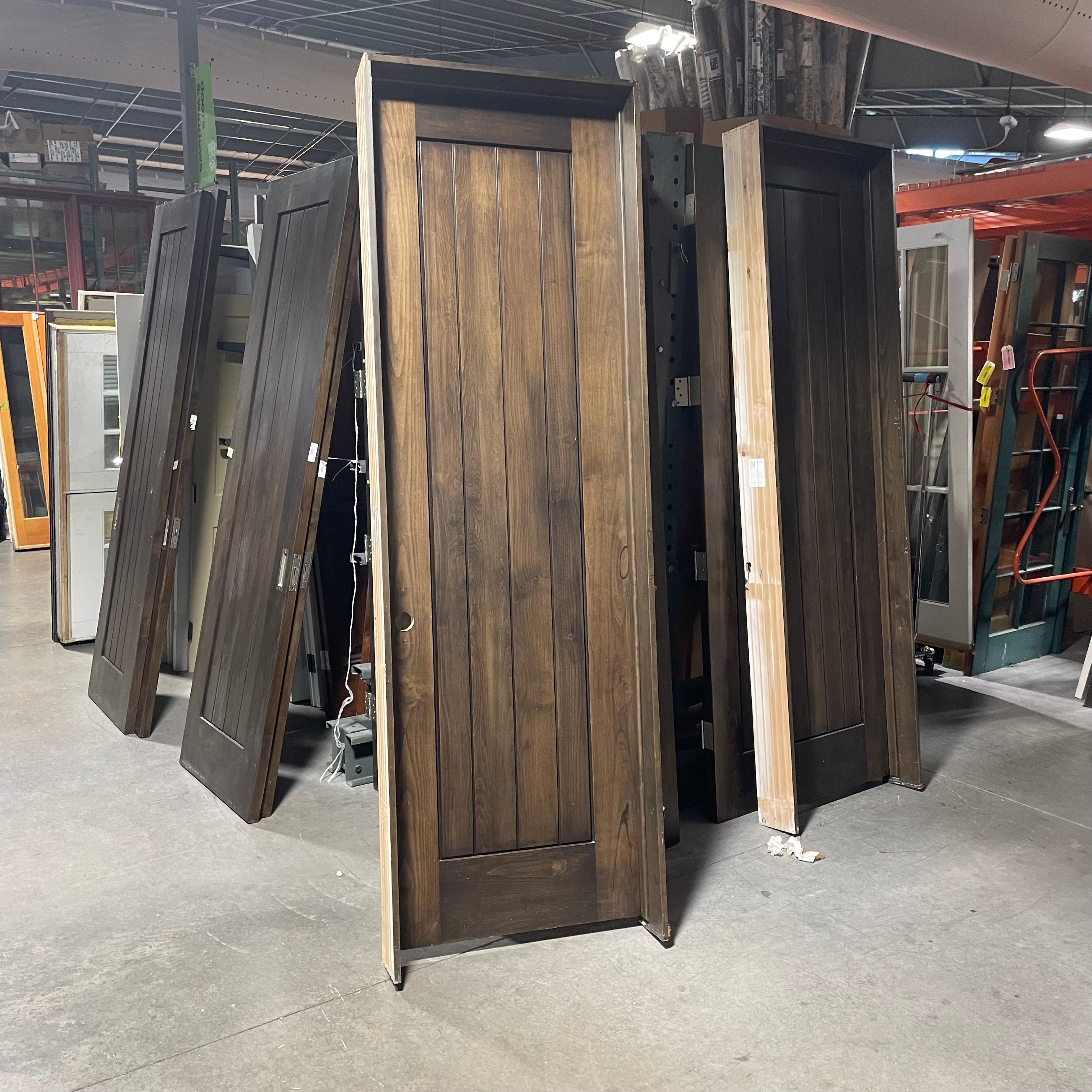 29.75"x 96"x 1.75" Rough Opening is 31.5"x 98.25"x 6.75" Brown Vertical Lined Walnut Interior Door with Jamb