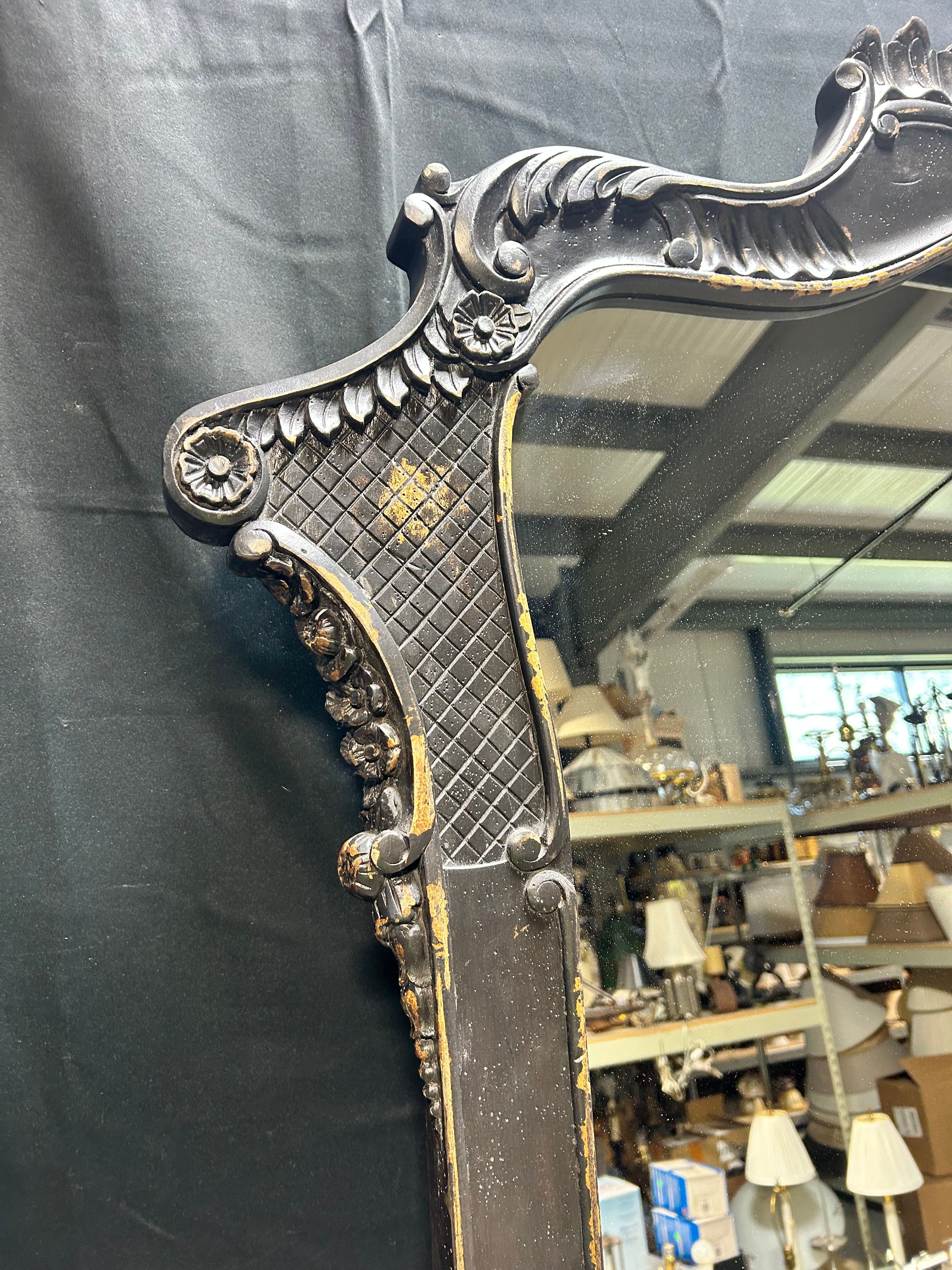 A French Louis XV Style Ornate Carved Blackened Finish 47.5"x 84" Mirror
