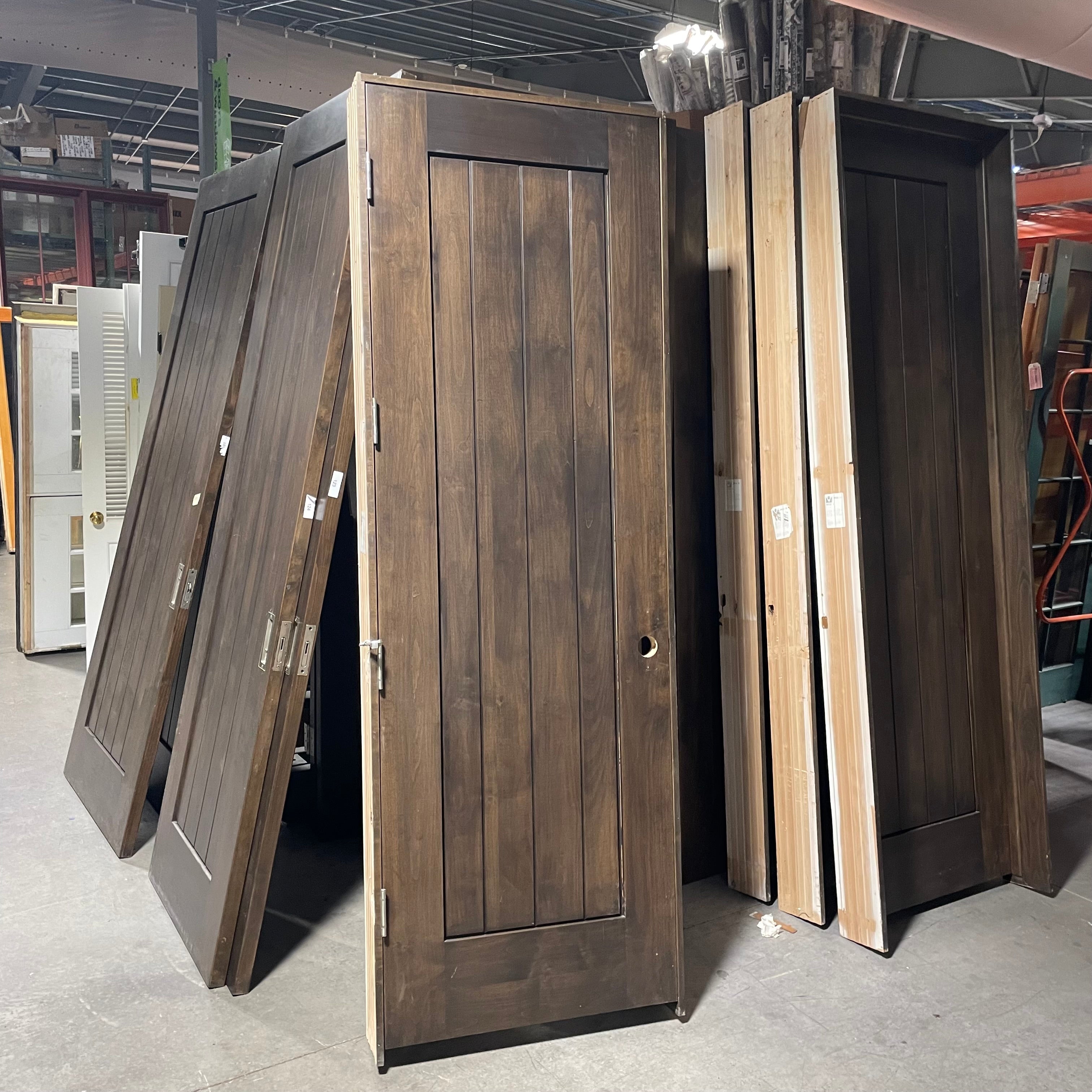 29.75"x 90"x 6.75" Rough Opening is 31.25"x 92.25"x 6.75" Brown Vertical Lined Walnut Interior Door with Jamb