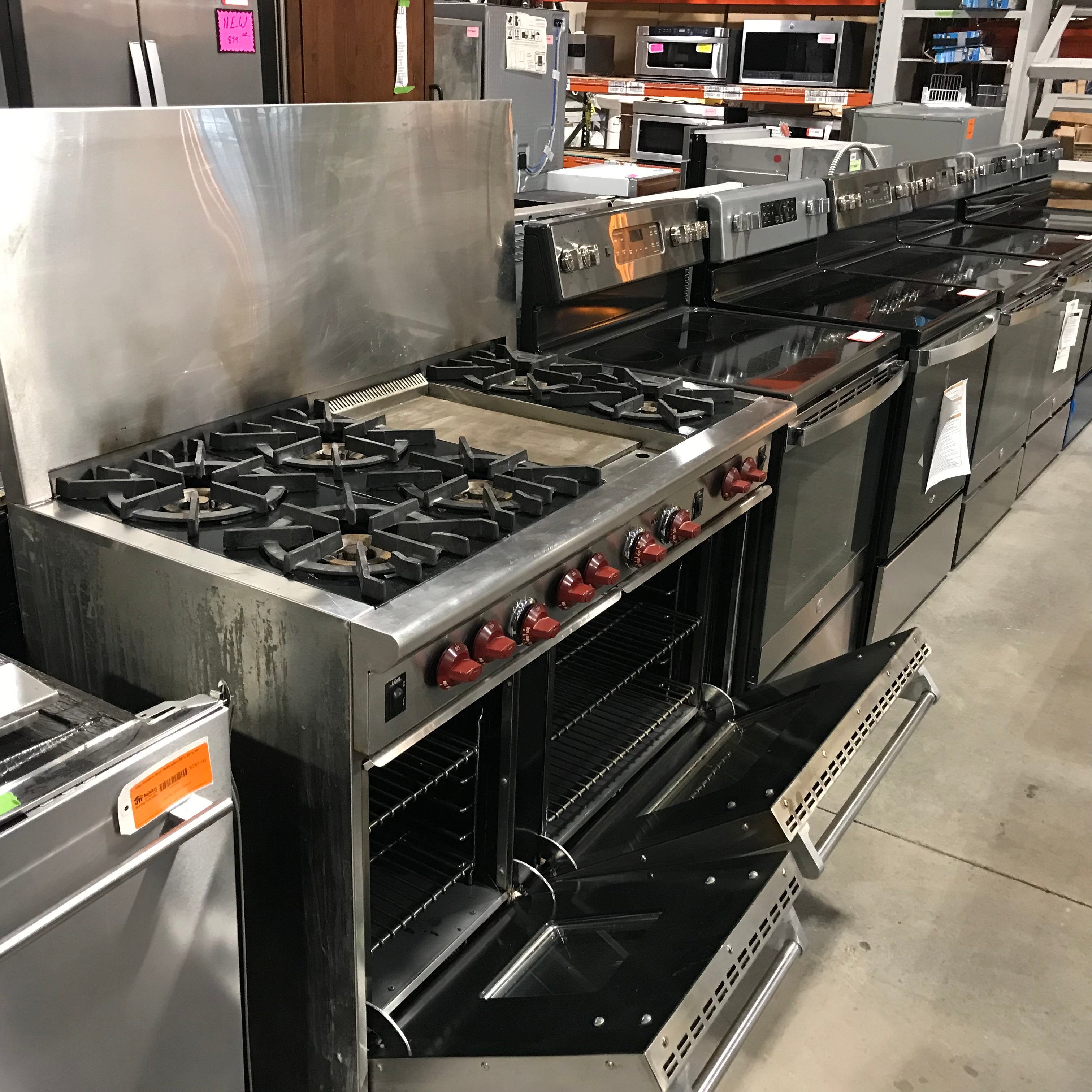 Wolf Stainless Steel, 6 Burner, Griddle, Double Oven Gas Range 48"x 27.5"x 36"