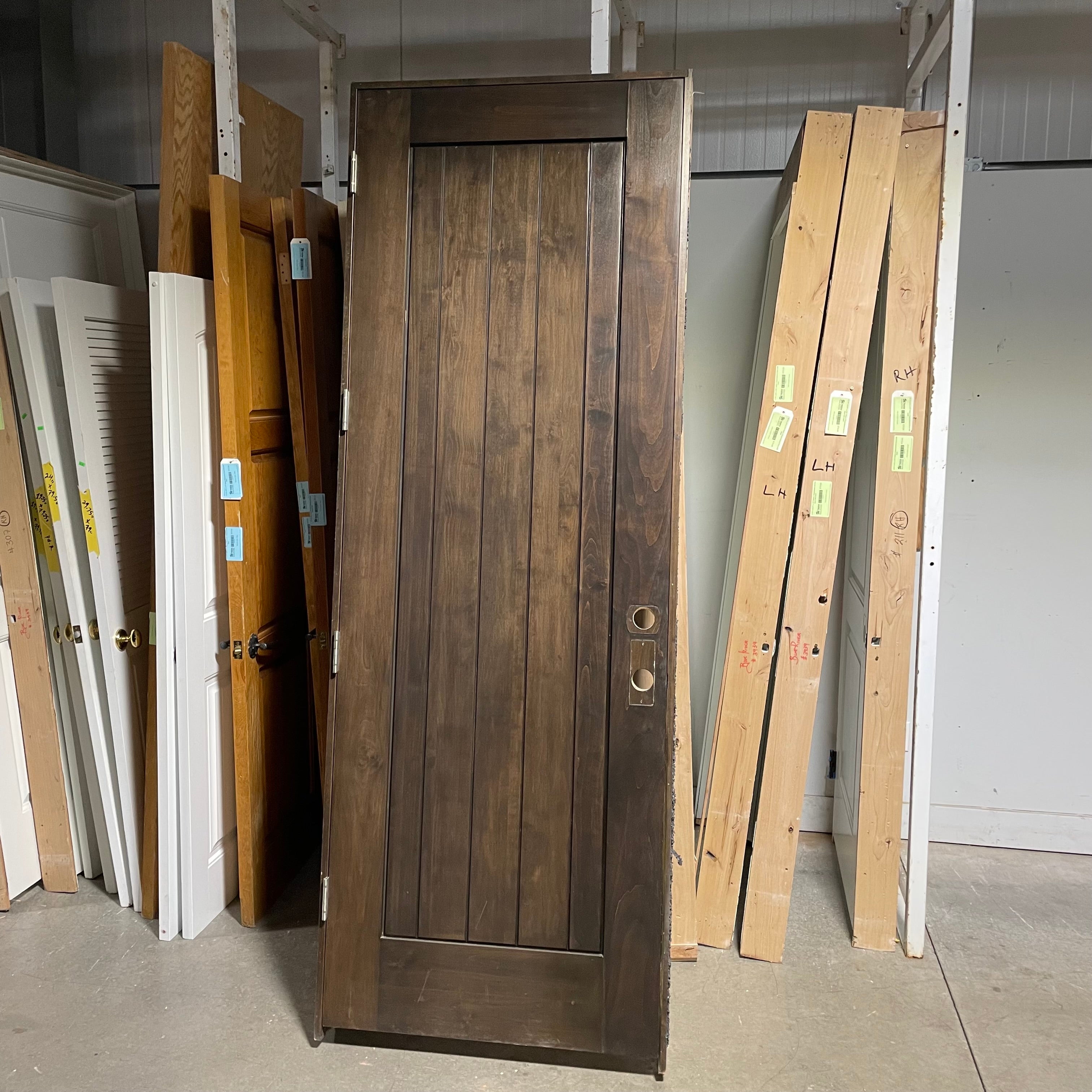 34"x 96"x 1.75" Rough Opening is 35.5"x 98.25"x 6.75" Brown Vertical Lined Walnut Interior Door with Jamb