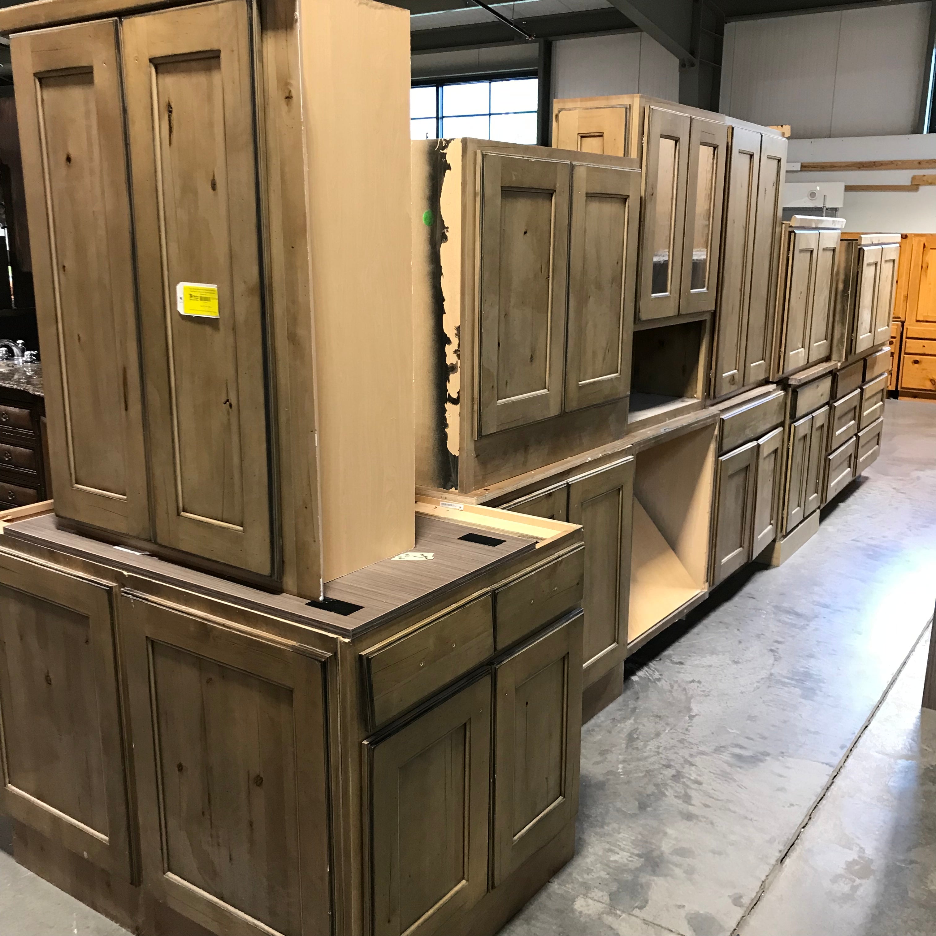 12 pc. Knotty Alder Stained Finish, No Hardware 2 Island Bases, 4 Lowers, 6 Uppers-one glass door Cabinet Set