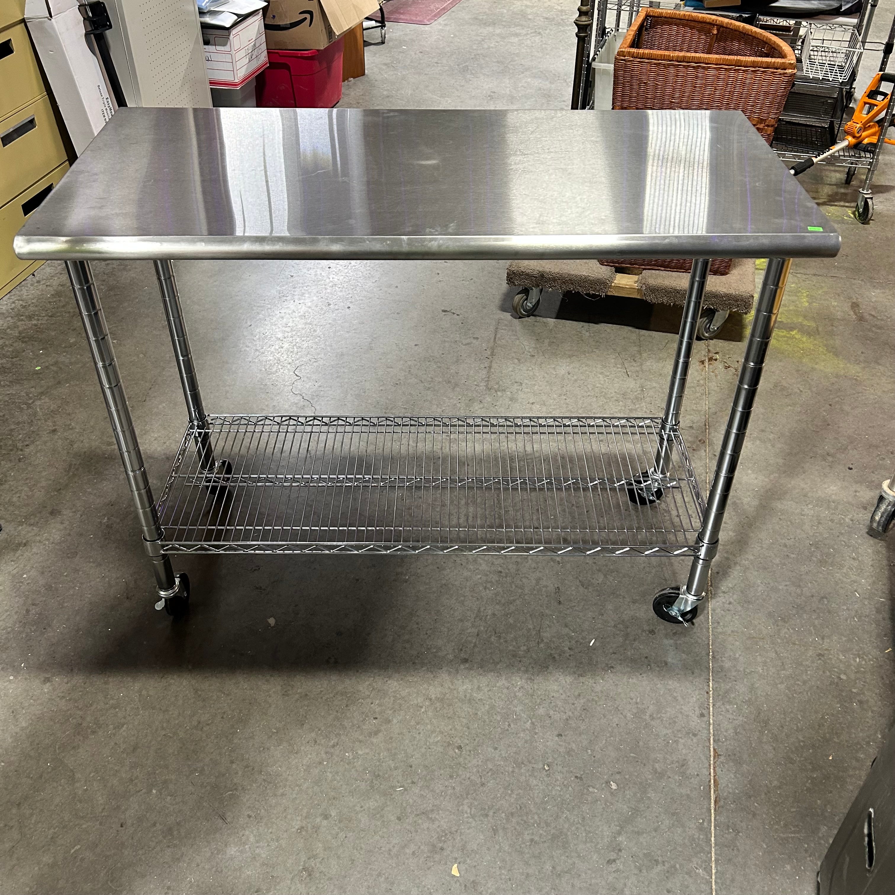 24"x 49"x 39.5" Stainless Steel Table with Bottom Shelf on Castors NSF