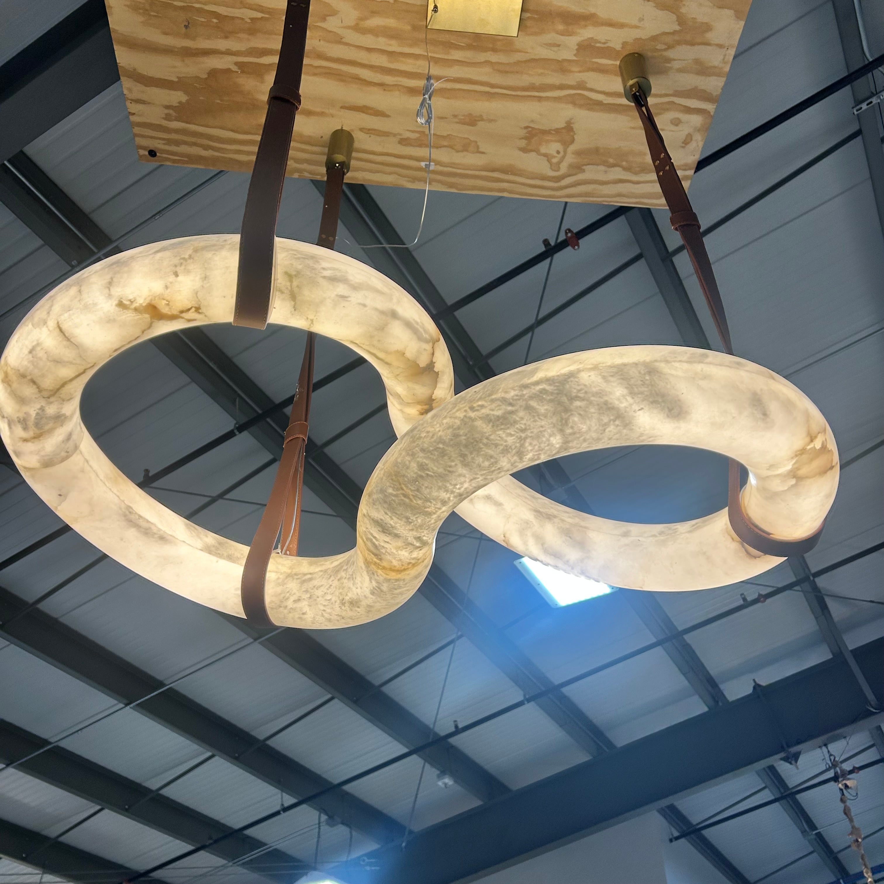 The Infinity Hanging Stone Sculptural Pendant With Brown Leather Straps 42"x 31"x 56"