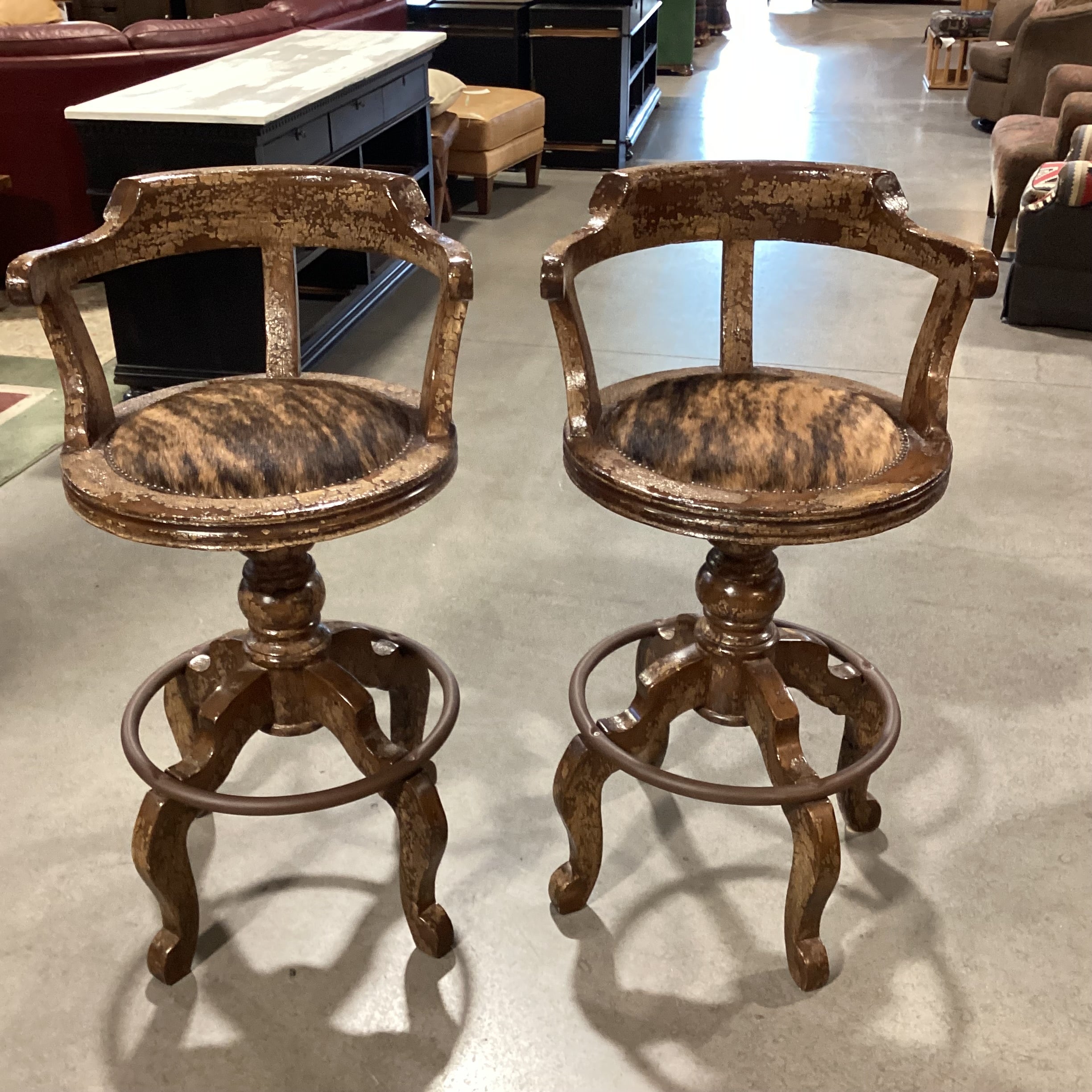 SET of 2 CBS Carved Wood Dark Desert Finish with Crackle Detail Brindle Cowhide Nailhead Swivel Barstools 31"