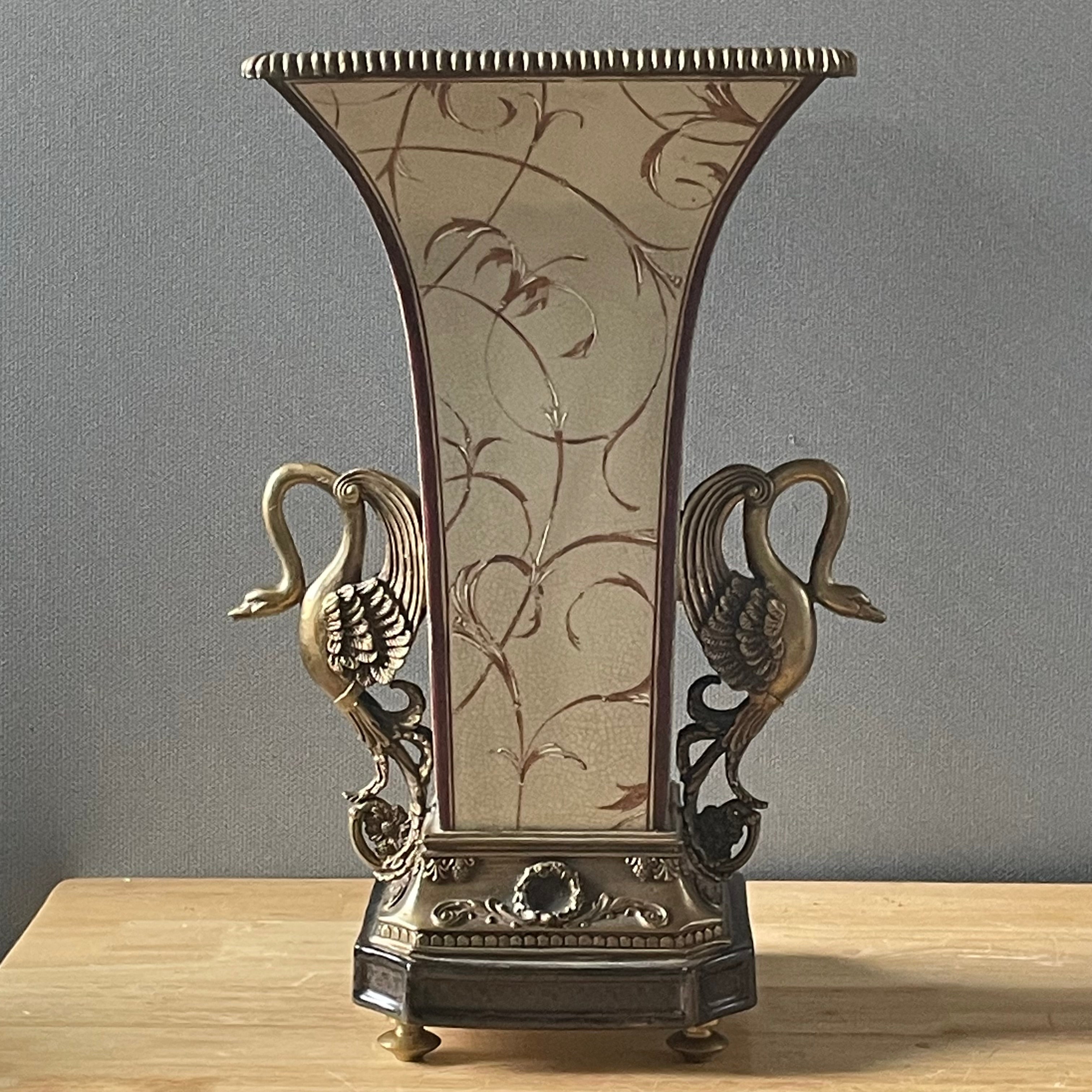 Castilian Imports Enamel Decorated Crackle Glazed Porcelain with Brass Swans on Footed Vase/Plinth, 12"x 9.5"x 17"