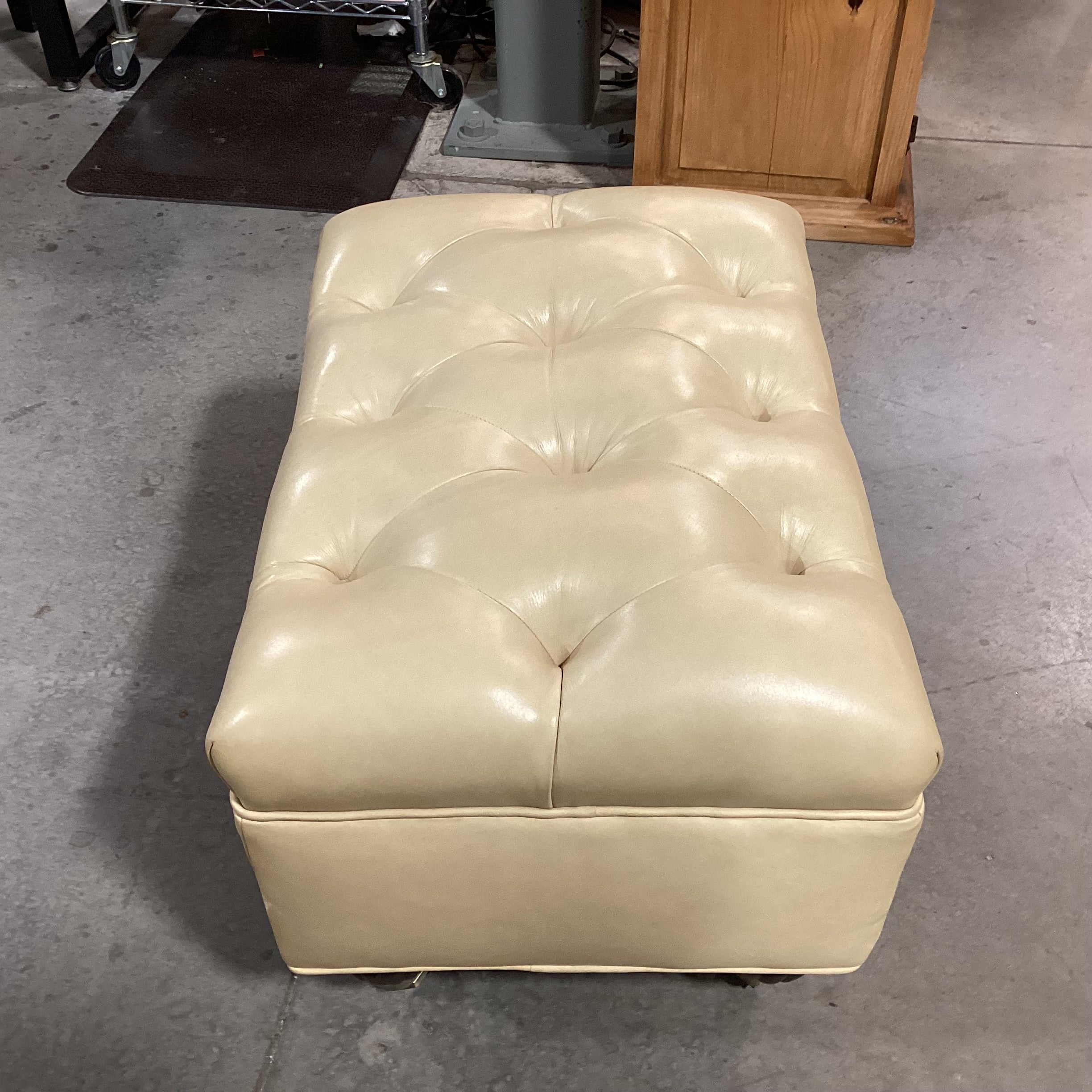 Blonde Leather Tufted Carved Wood & Caster Feet Ottoman 25"x 18"x 17"