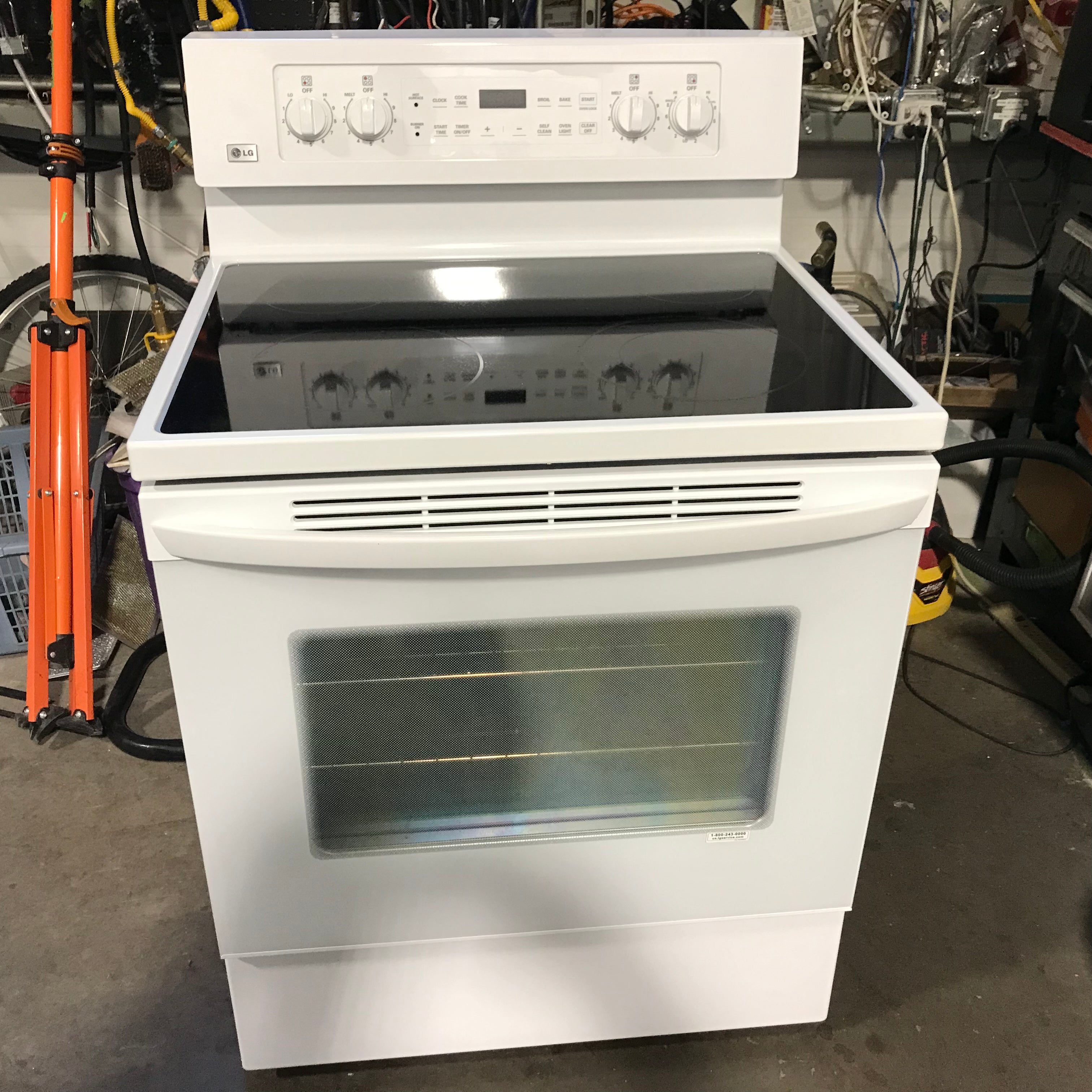 LG White Glass-Top, 4 Burner Electric Range, 30"x 25"x 46"