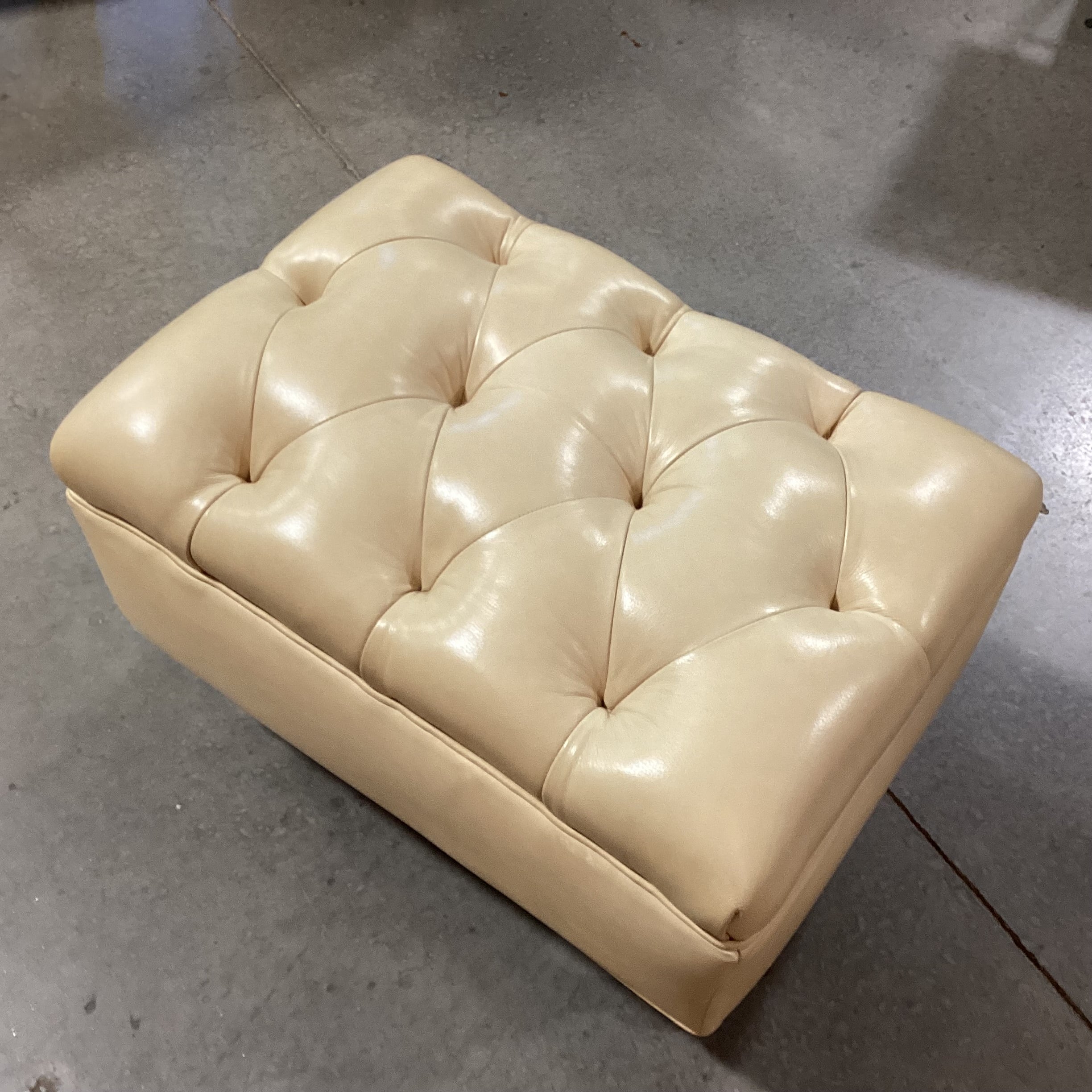 Blonde Leather Tufted Carved Wood & Caster Feet Ottoman 25"x 18"x 17"