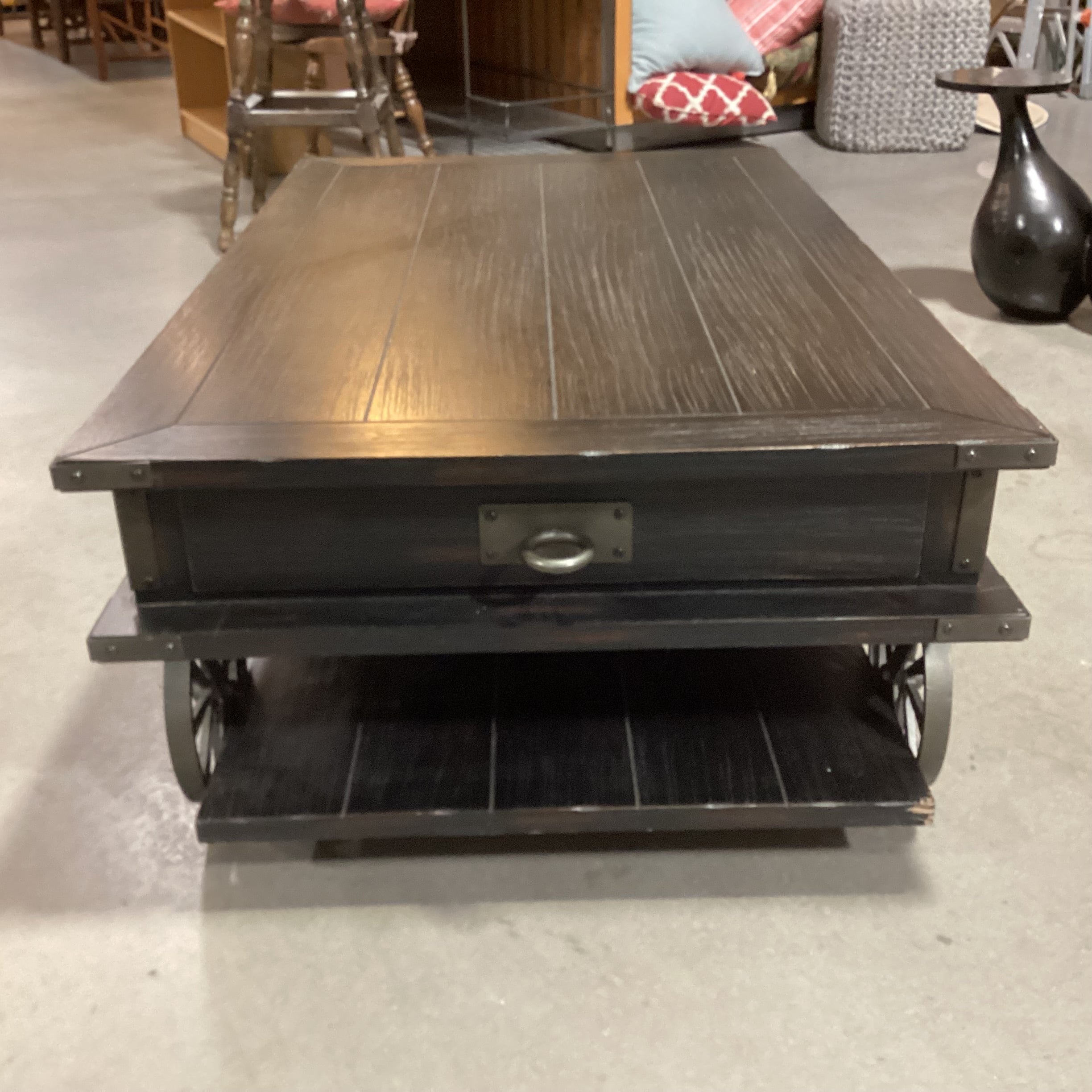Magnussen Home Sheffield Antiqued Black Wood 2 Drawer with Wheels Cart Like Coffee Table 50"x 30"x 17.5"