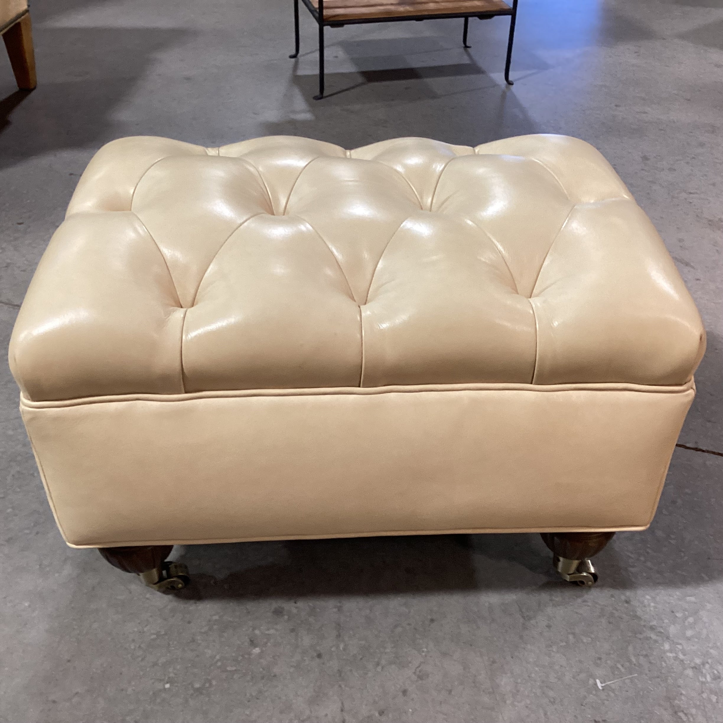 Blonde Leather Tufted Carved Wood & Caster Feet Ottoman 25"x 18"x 17"