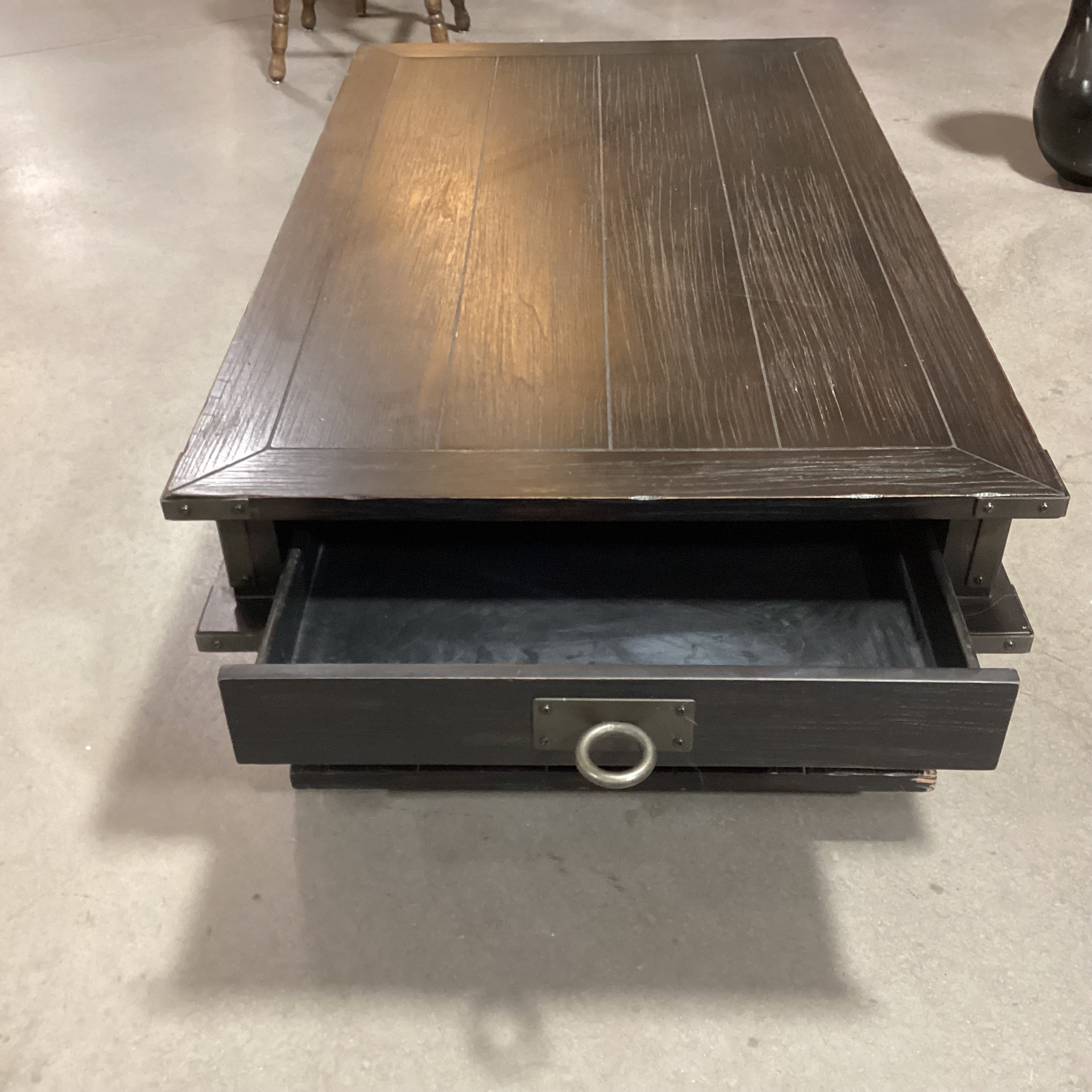 Magnussen Home Sheffield Antiqued Black Wood 2 Drawer with Wheels Cart Like Coffee Table 50"x 30"x 17.5"