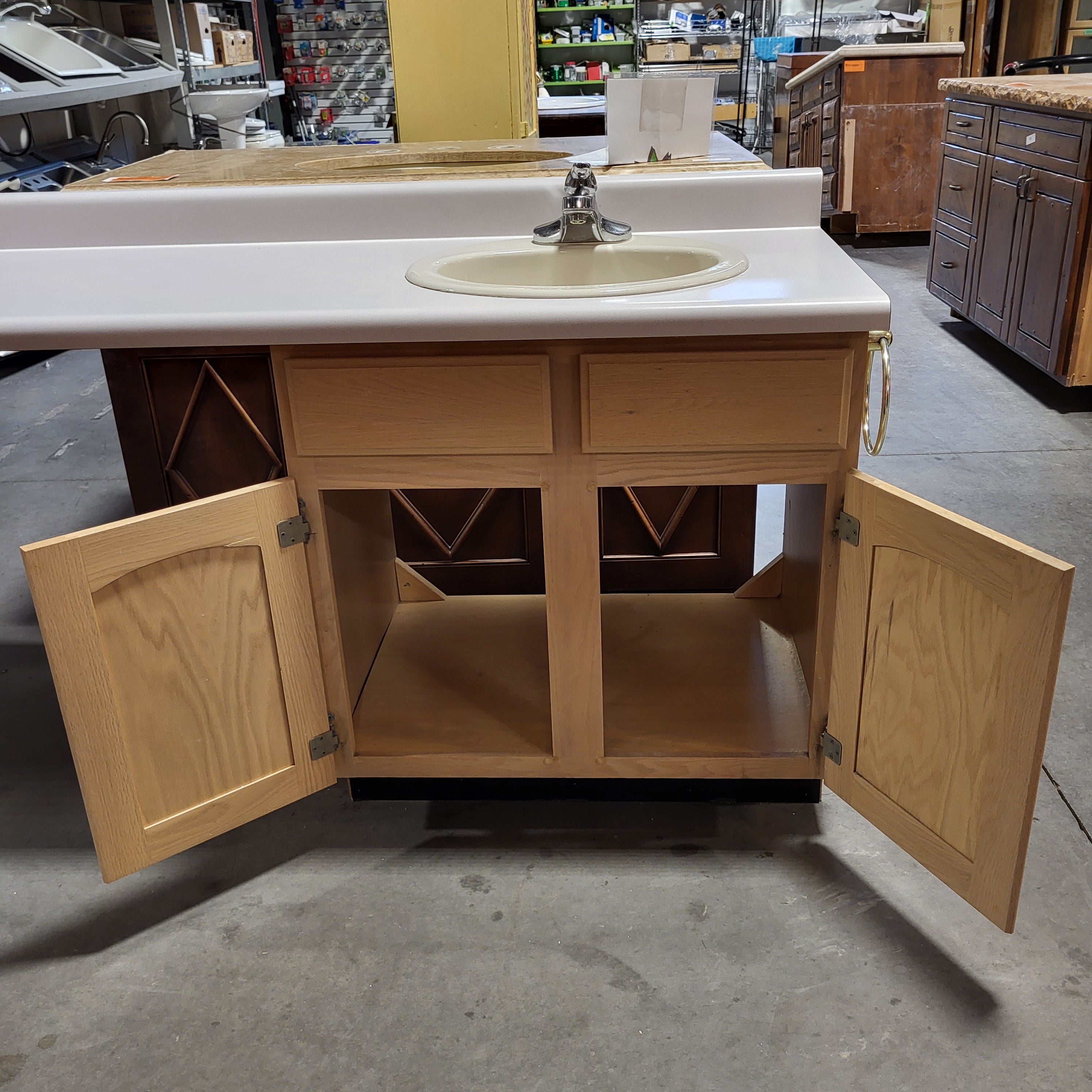 61"x 22.25"x 36"  Light Oak Base With Long Laminate Top Sink And Faucet Vanity