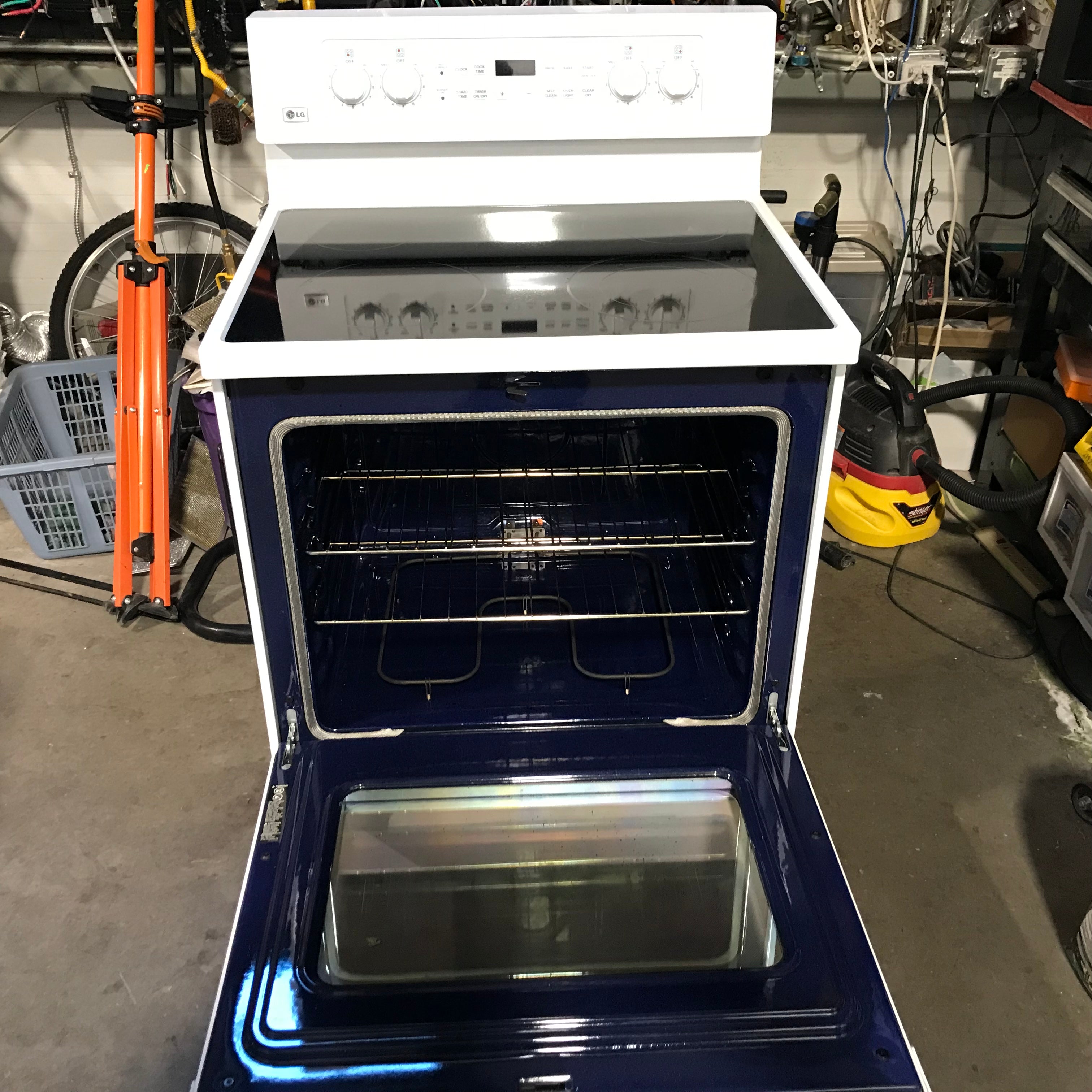 LG White Glass-Top, 4 Burner Electric Range, 30"x 25"x 46"
