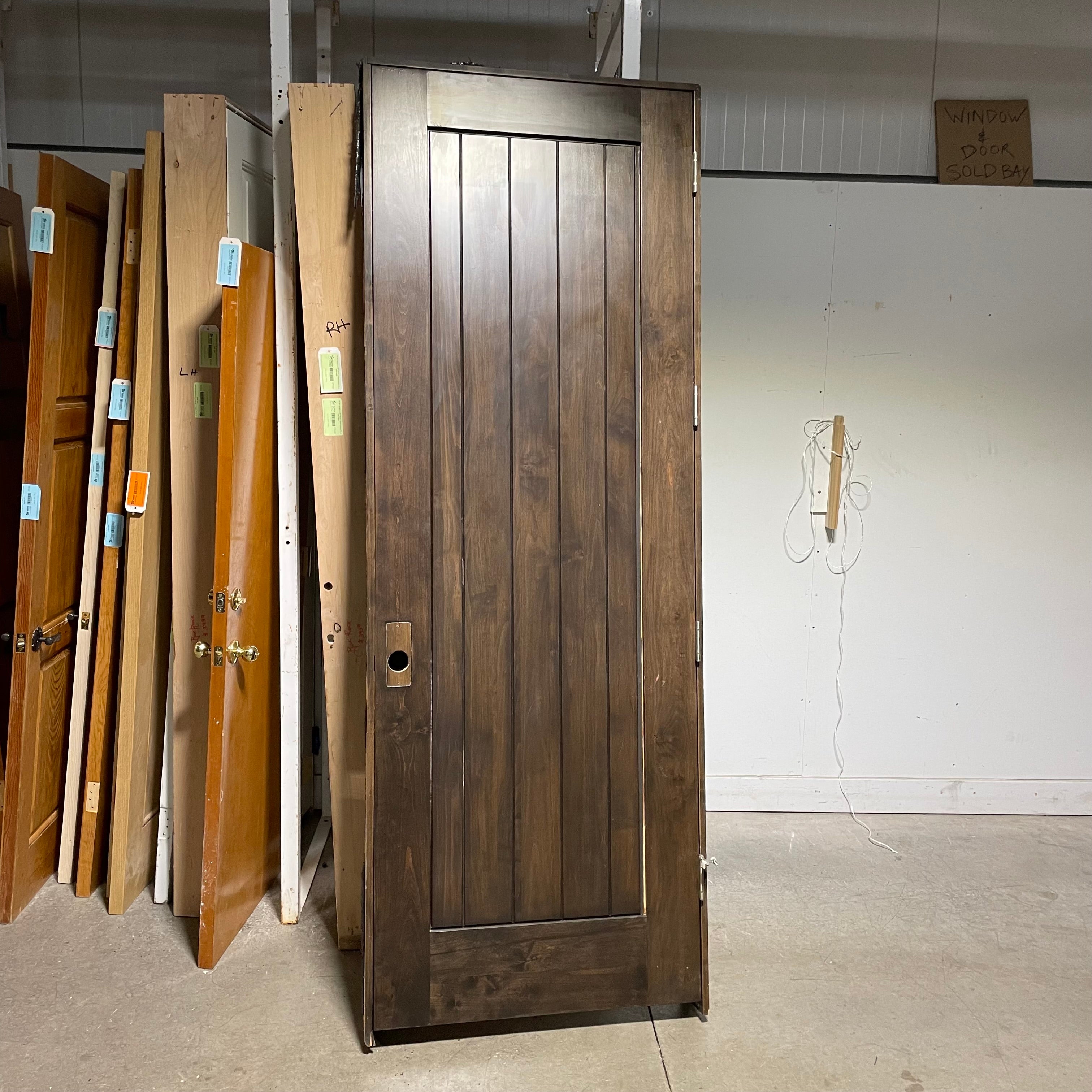 33.75"x 96"x 1.75" Rough Opening is 35.25"x 98.25"x 6.75" Brown Vertical Lined Walnut Interior Door with Jamb