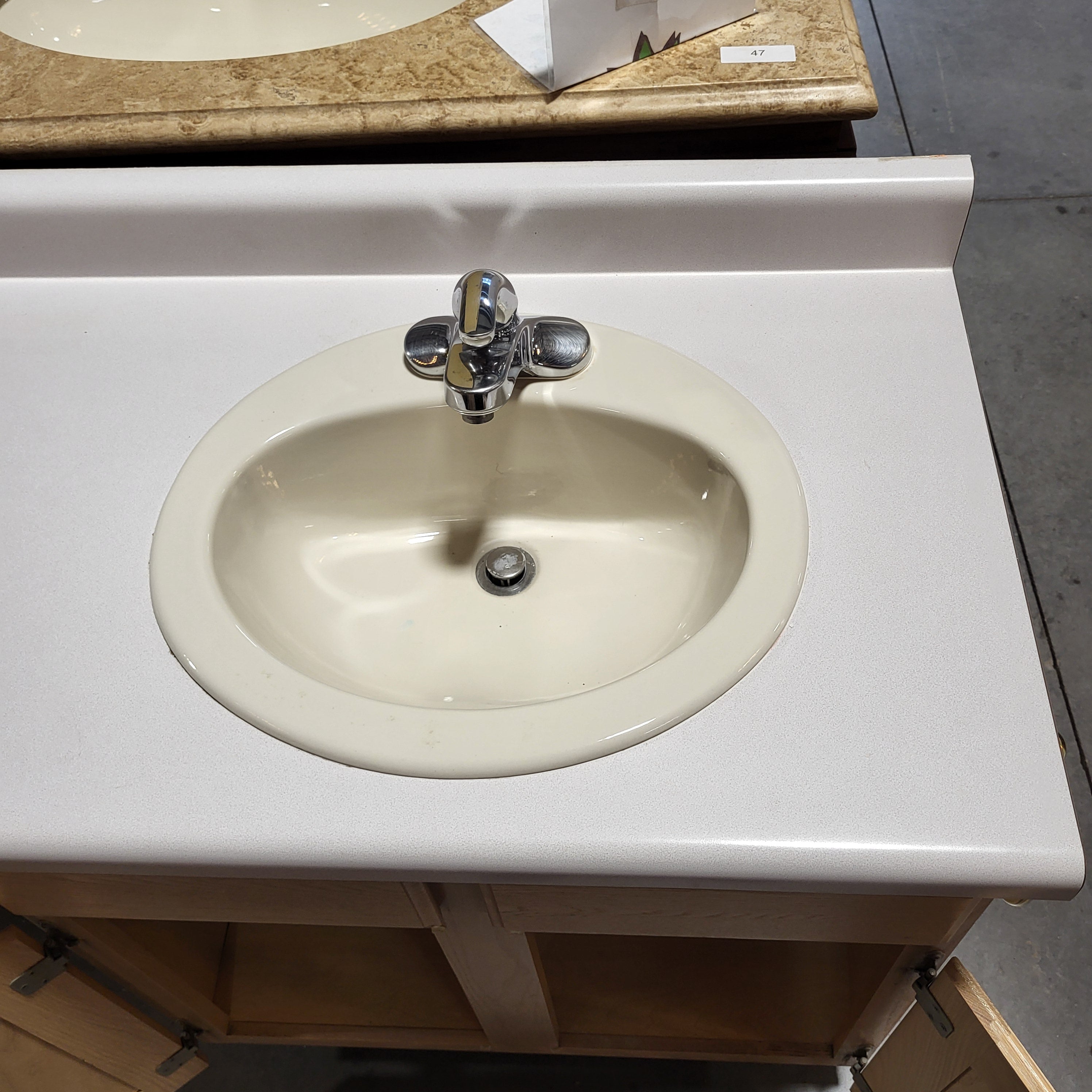 61"x 22.25"x 36"  Light Oak Base With Long Laminate Top Sink And Faucet Vanity