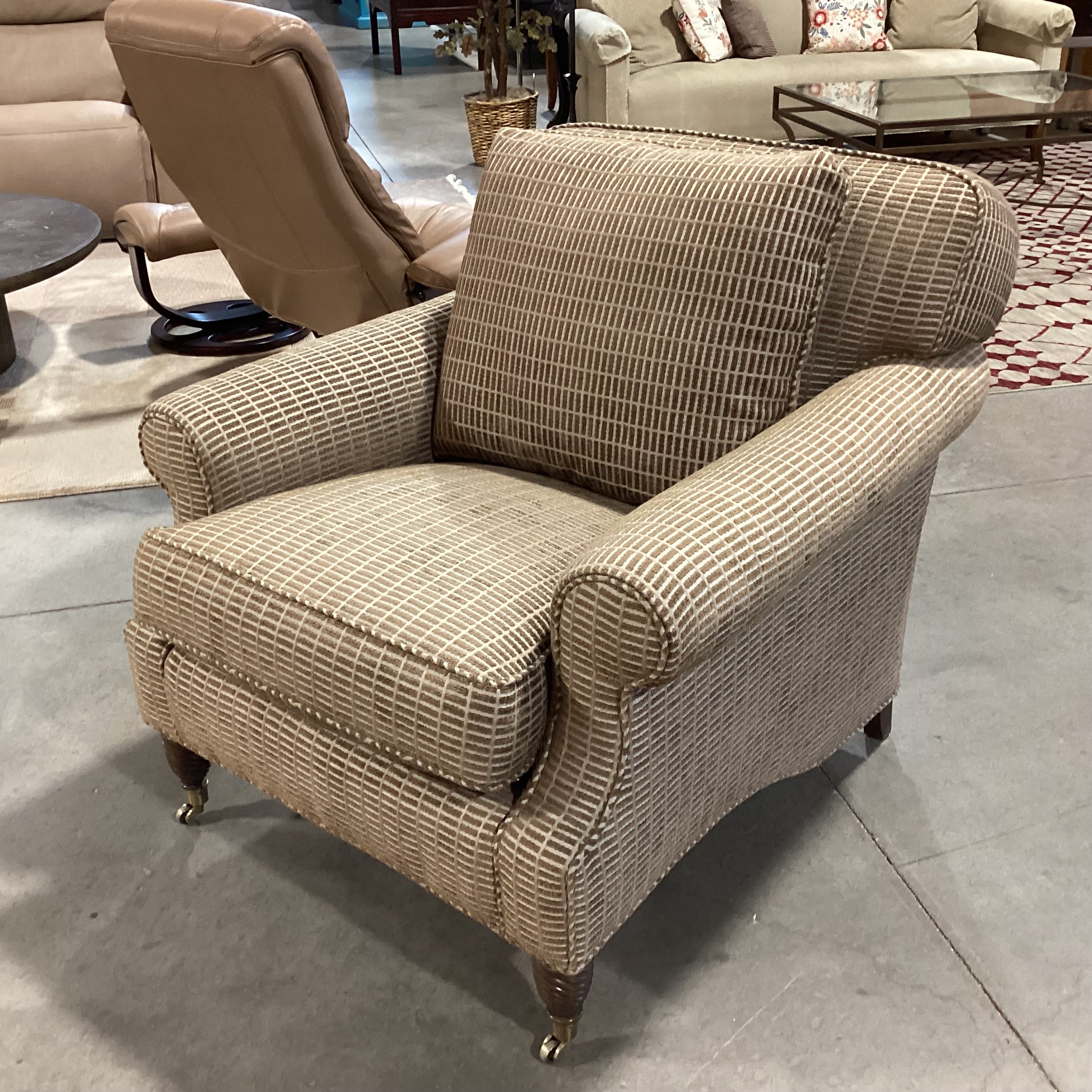 Edward Ferrell Brown & Tan Raised Woven with Carved Foot Brass Casters Chair 35"x 42"x 33"