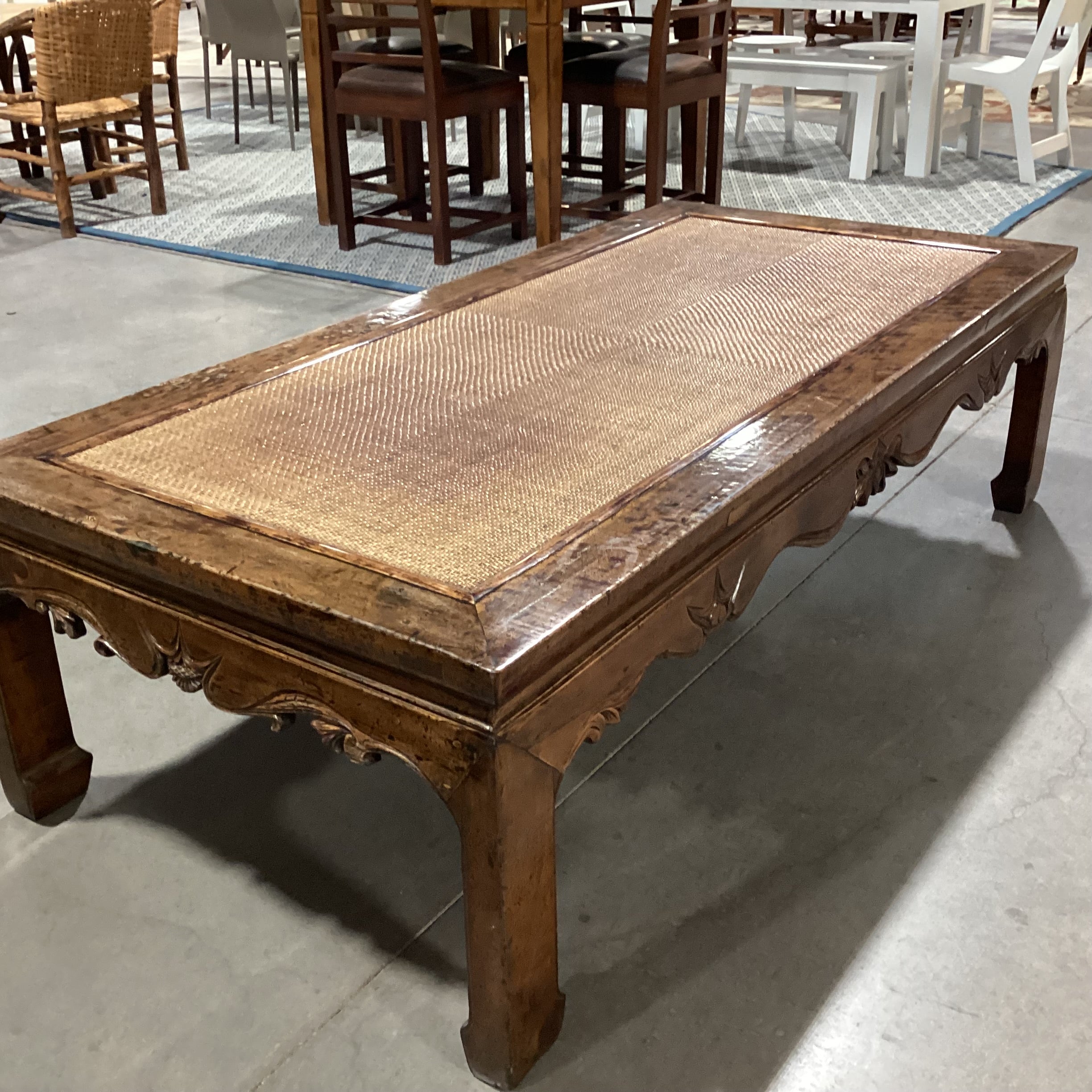 Asian Inspired Carved Distressed Wood & Rattan Raffia Woven Inset Coffee Table 72"x 35"x 21"
