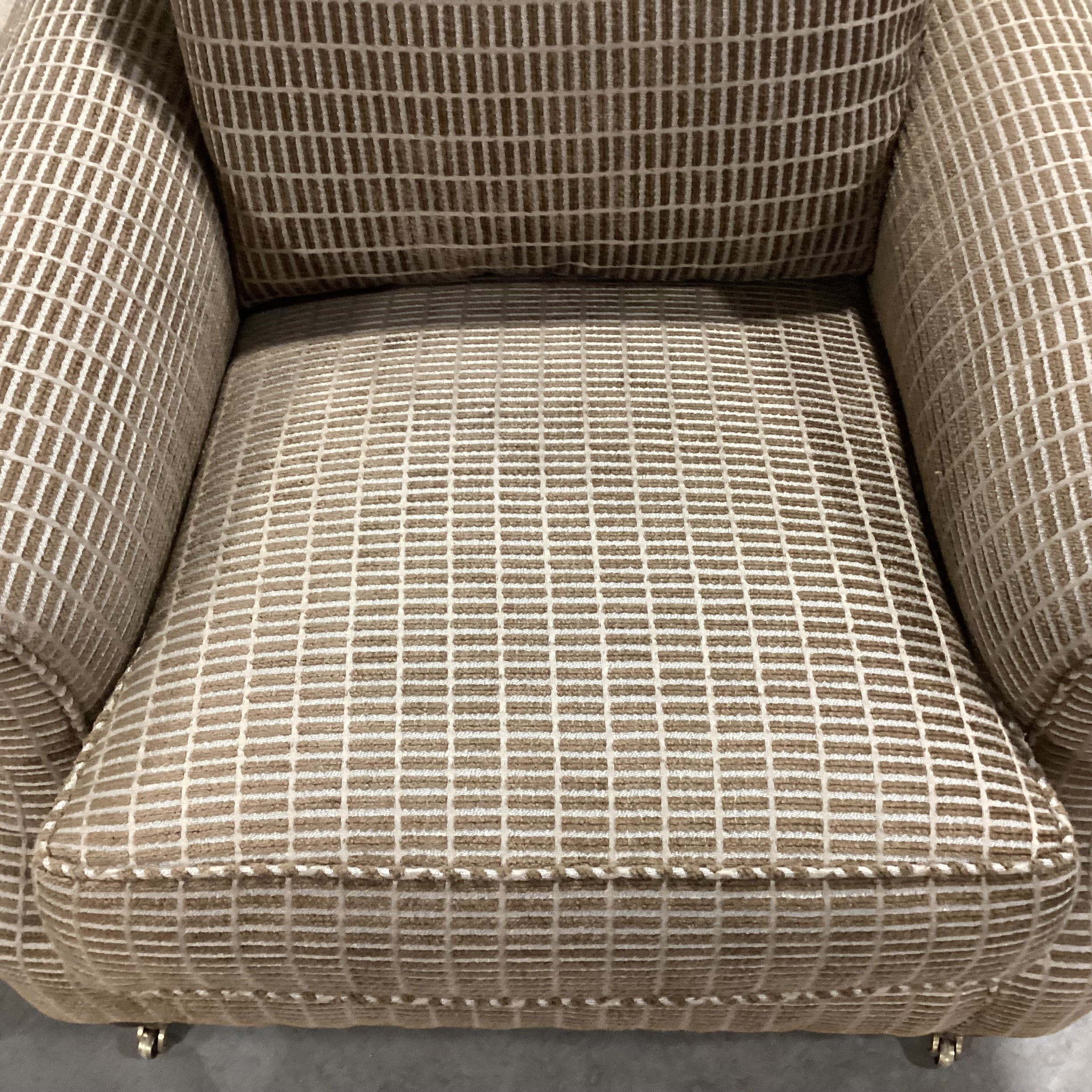 Edward Ferrell Brown & Tan Raised Woven with Carved Foot Brass Casters Chair 35"x 42"x 33"