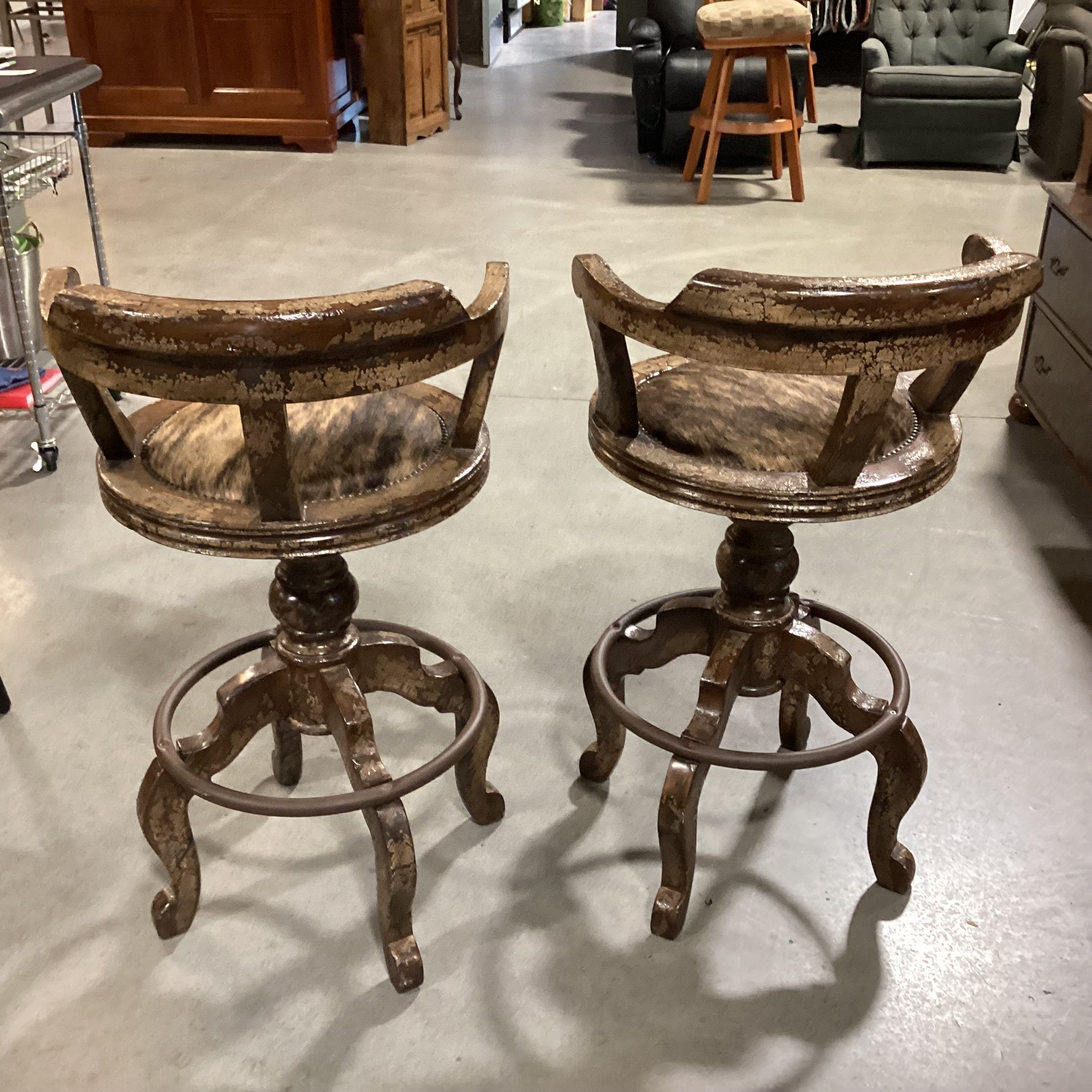 SET of 2 CBS Carved Wood Dark Desert Finish with Crackle Detail Brindle Cowhide Nailhead Swivel Barstools 31"