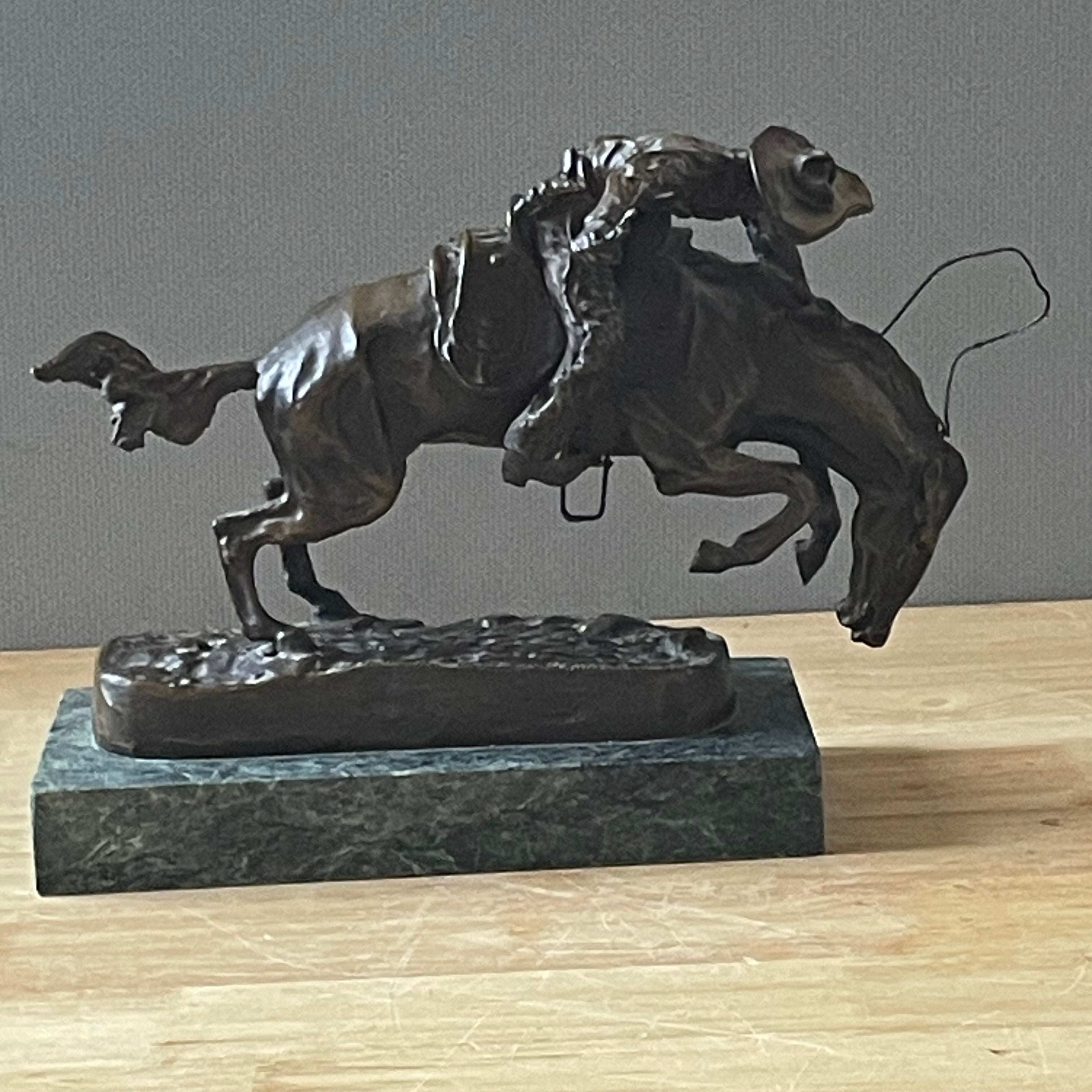 Frederic Remington Bronze Reproduction of "The Bronco Buster" on Green Marble Base, 12"x 8"x 8.75"
