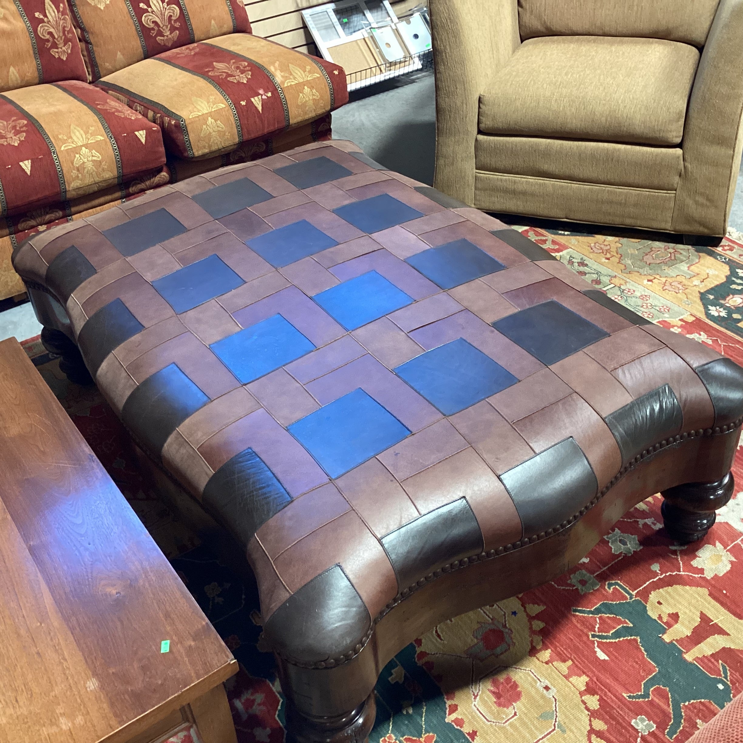 T J Hooker Brown Tones Patchwork Leather Nailhead & Carved Distressed Wood Cocktail Ottoman 61"x 41"x 20"