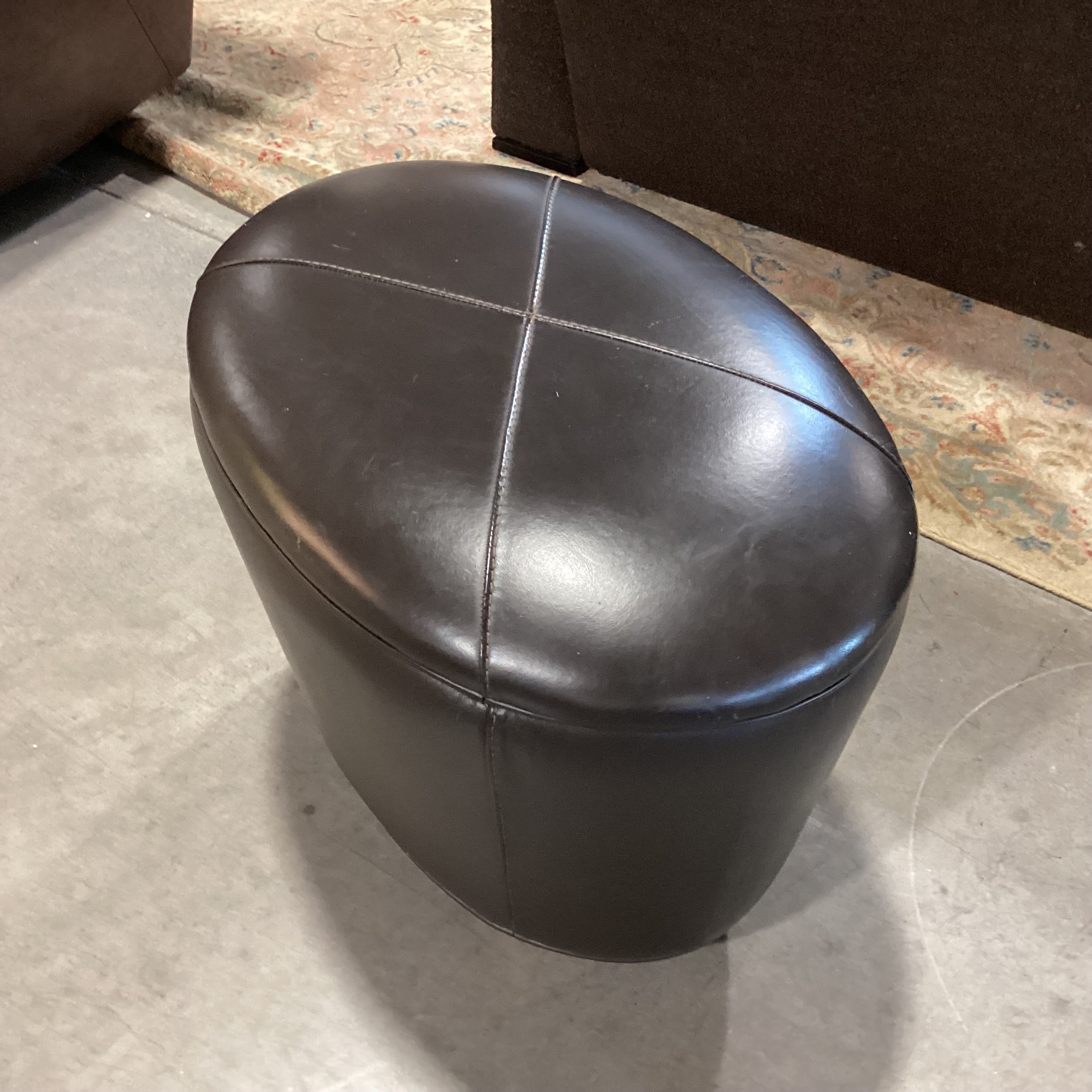 Oval Chocolate Leather & Wood Feet Ottoman 26"x 18"x 18"