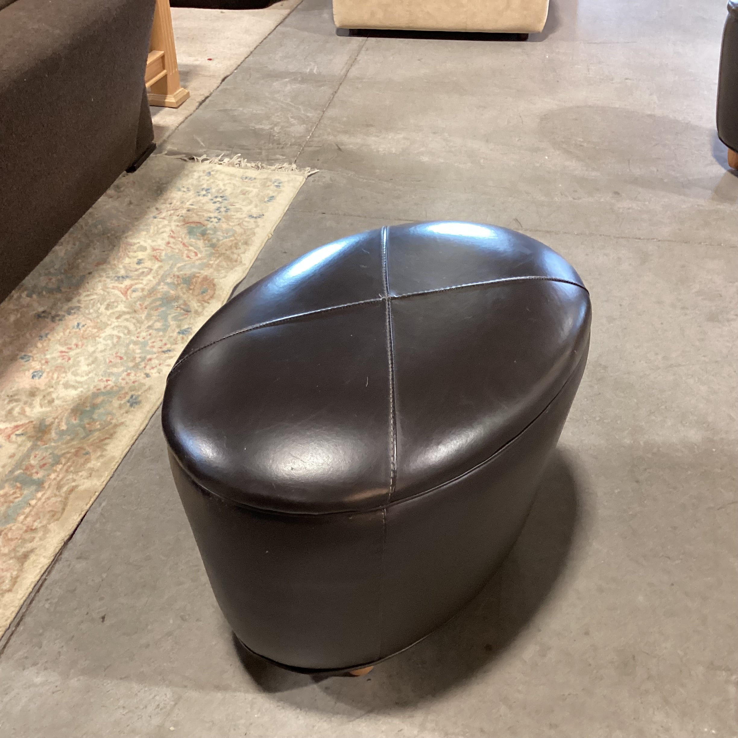 Oval Chocolate Leather & Wood Feet Ottoman 26"x 18"x 18"