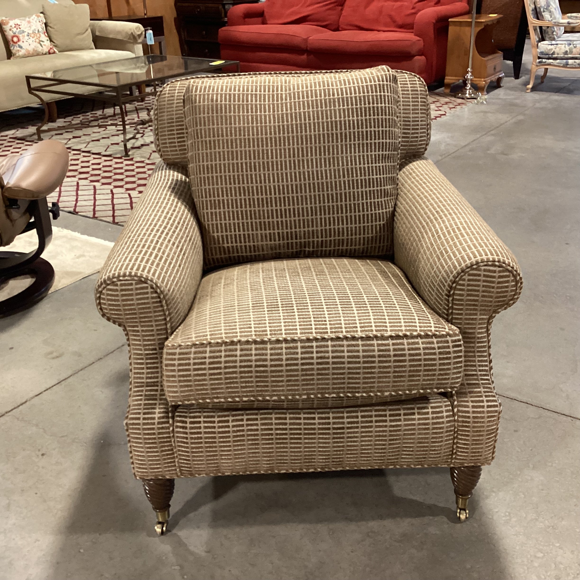 Edward Ferrell Brown & Tan Raised Woven with Carved Foot Brass Casters Chair 35"x 42"x 33"