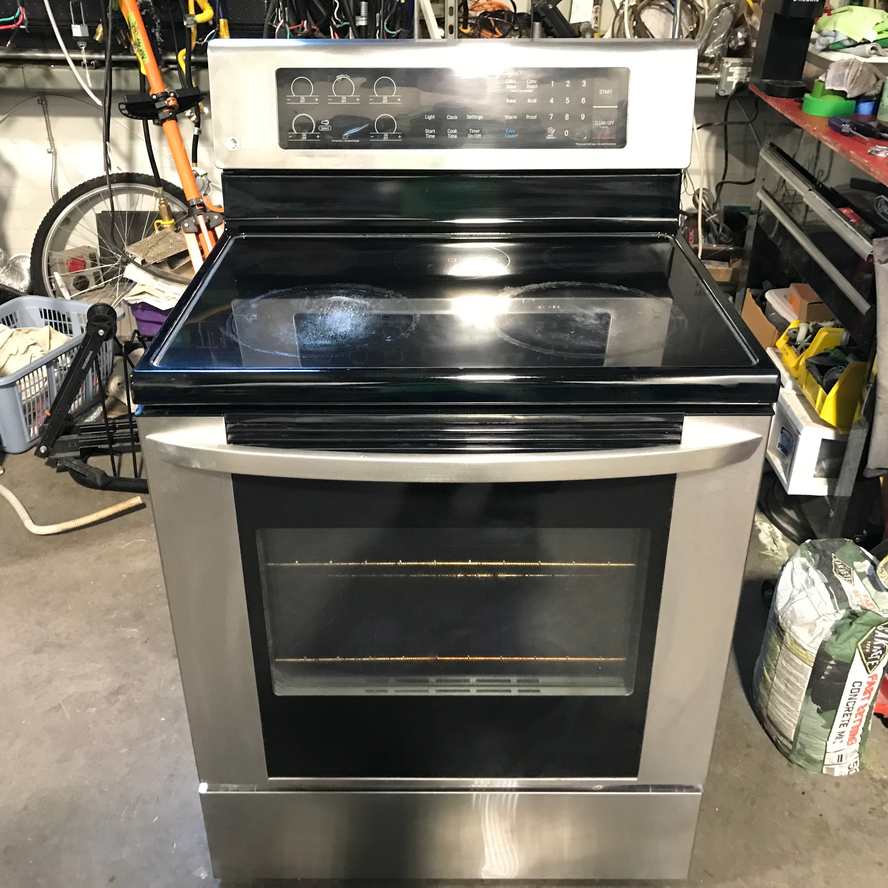 LG Stainless Steel 4 Burners, Warmer, Glass Top Electric Range 30"x 25"x 47"
